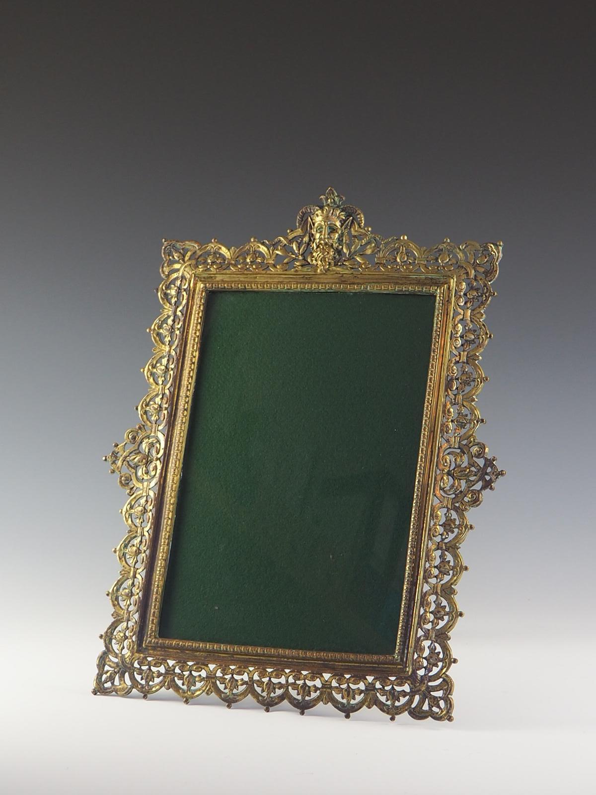 Large Antique Ornate Brass Photo Frame with Greek God Pan . Super Heavy, good quality and really beautiful.

The frame accepts a photo / picture size of c. 11