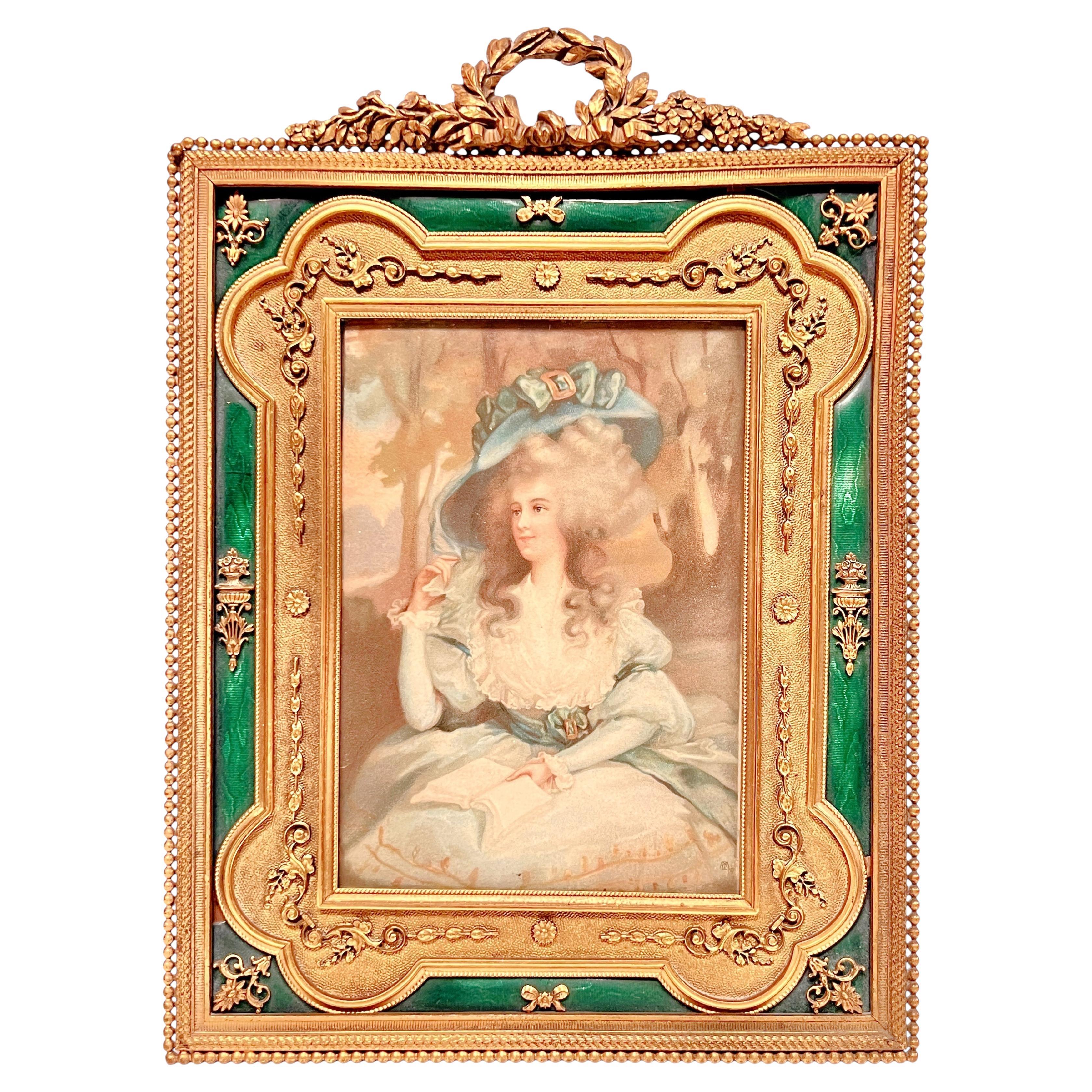 Marco antiguo de bronce dorado esmaltado en verde del siglo XIX en venta