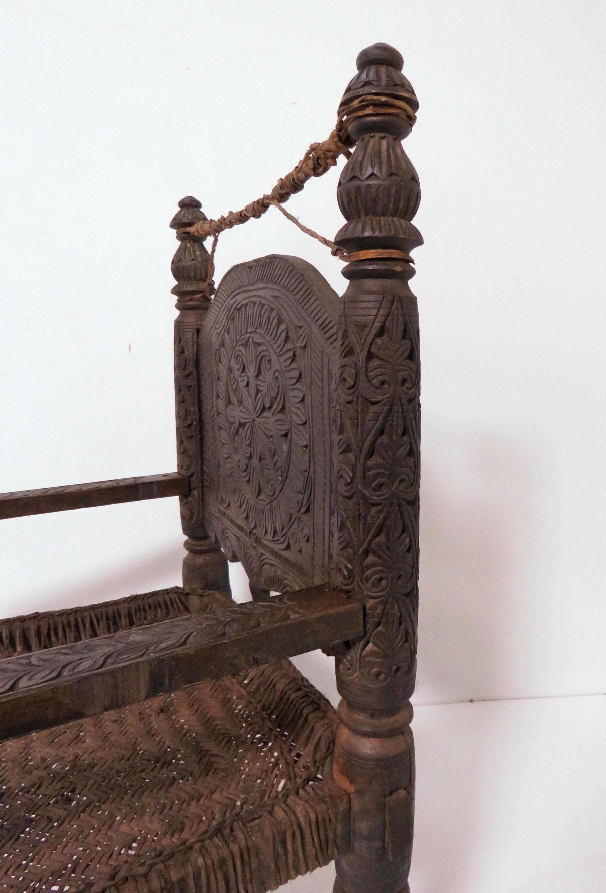 Antique 19th Century Hand Carved Afghan Chief's Chair with Stool In Good Condition In Peabody, MA