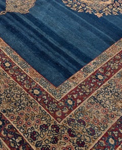 Antique 19th Century Hand-Knotted Wool Navy Field Carpet with Floral Medallion
