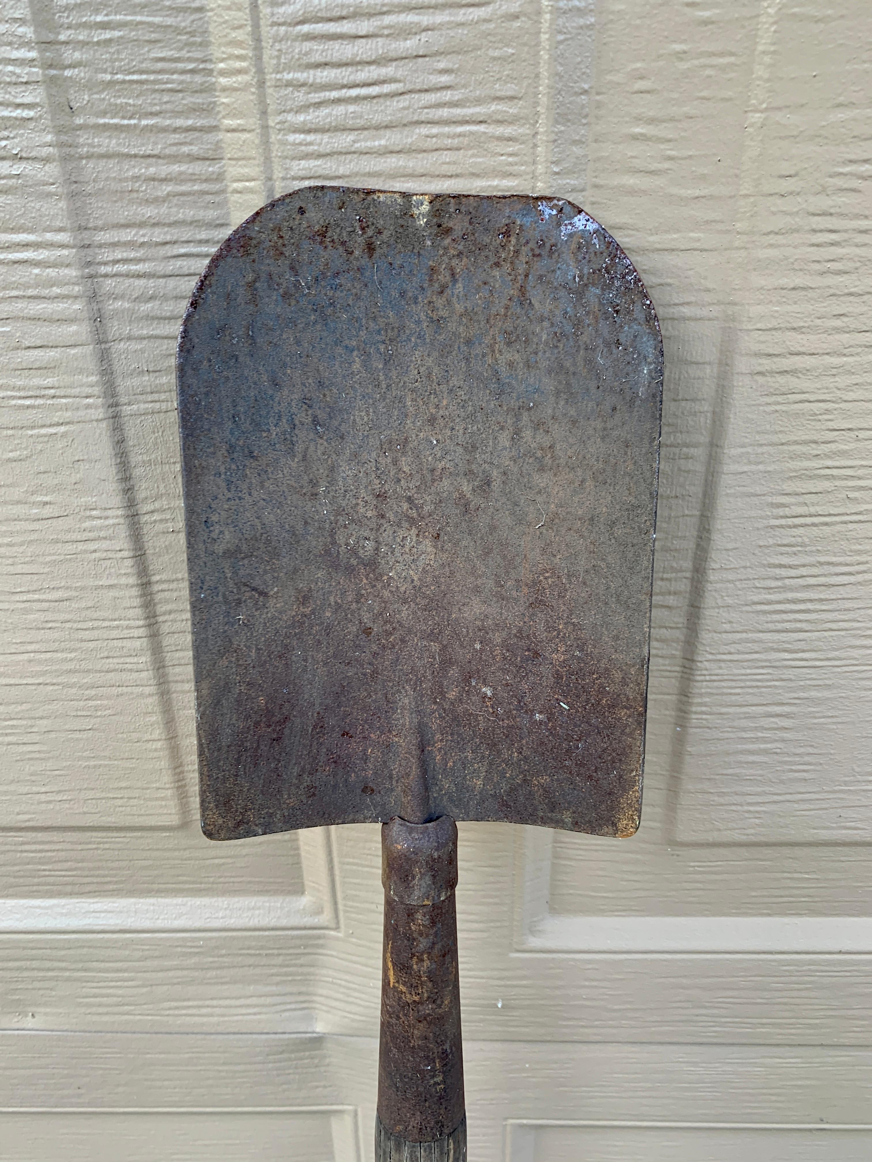 A beautiful antique rustic, farmhouse, or country wooden and iron hand made garden shovel. This would be ideal for an installation on a large wall on a custom wall mount. 

USA, Circa late 19th century

Measures: 4.75