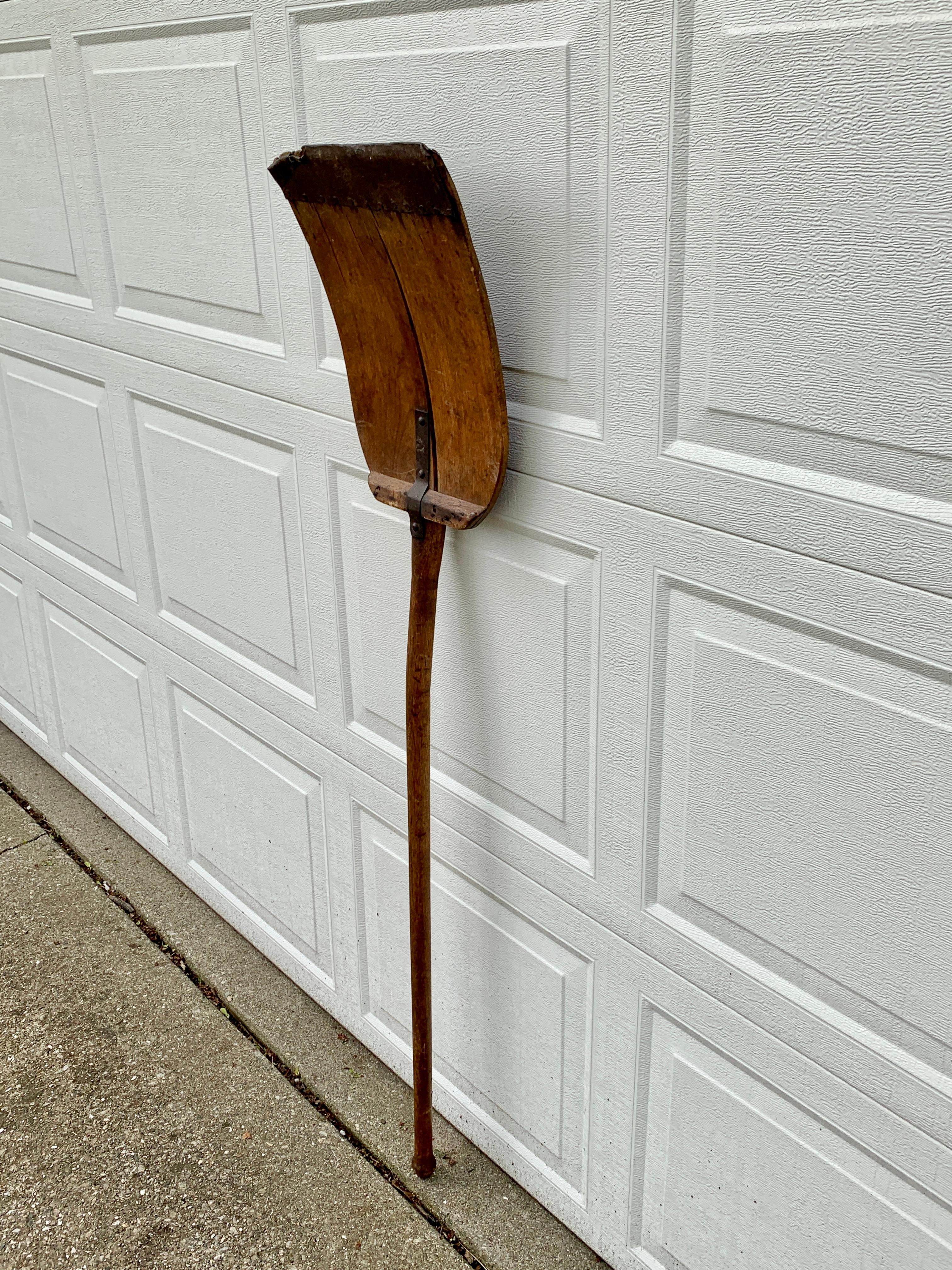 antique wooden handle shovels