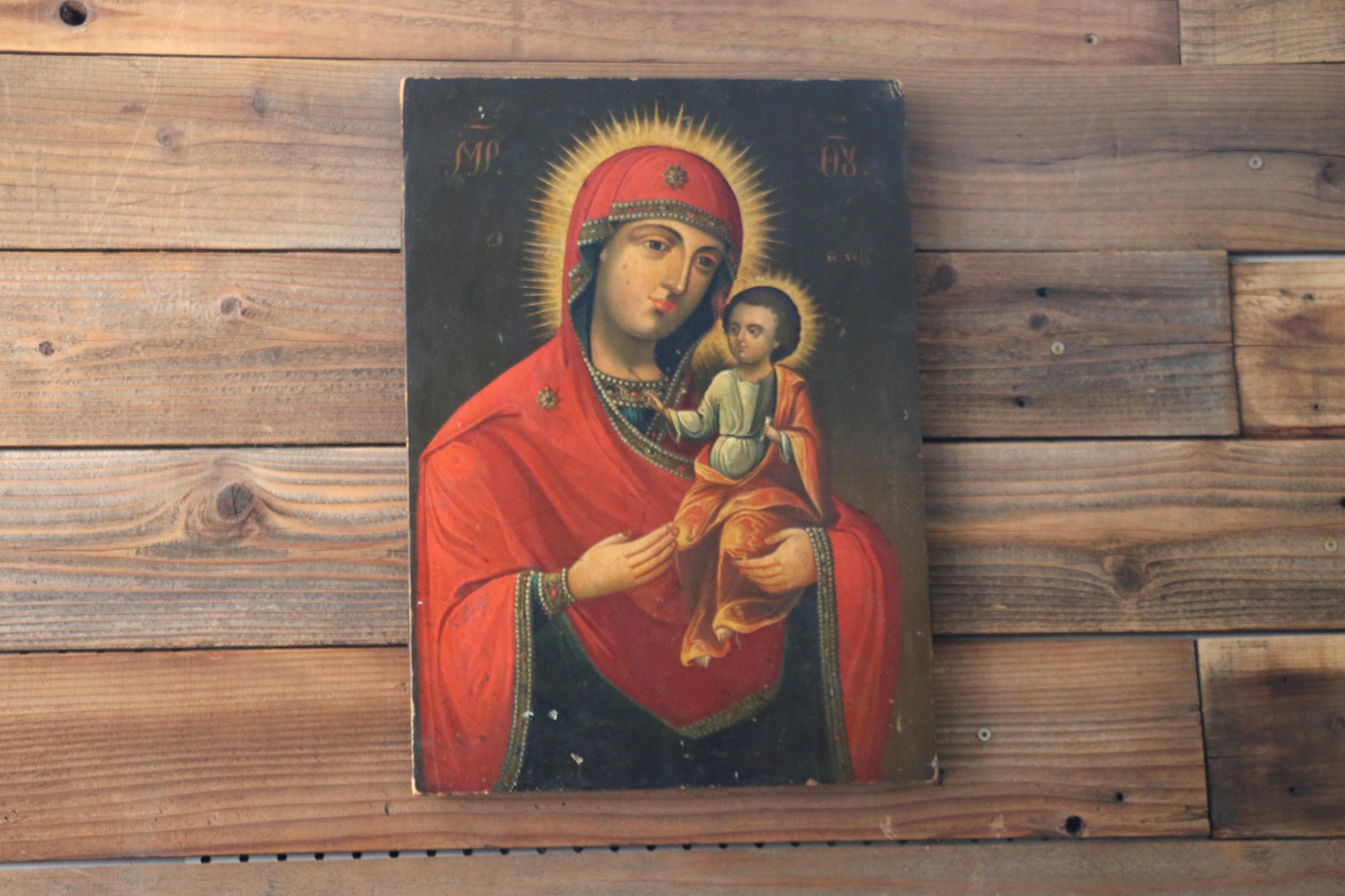 Wonderful hand painted on wood Russian Icon of mother and child. This painting is very well done and it is in good condition according to its age. From the 19th Century. Very well kept. The original color of the wood has been preserved. This
