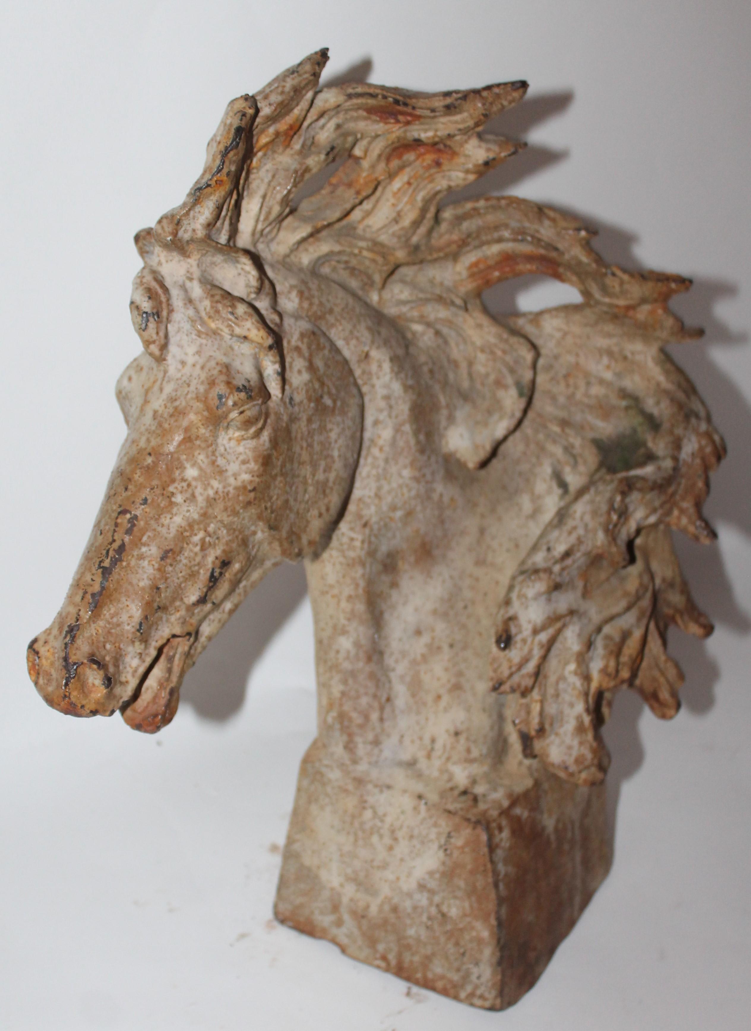 19th century original cream painted iron horse head from a hitching post. This fine folk art horse is so fantastic and in very good condition. This horse has a three dimensional look.