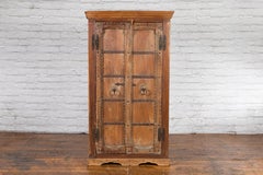 Antique 19th Century Indian Armoire with Metal Braces and Hand-Carved Décor