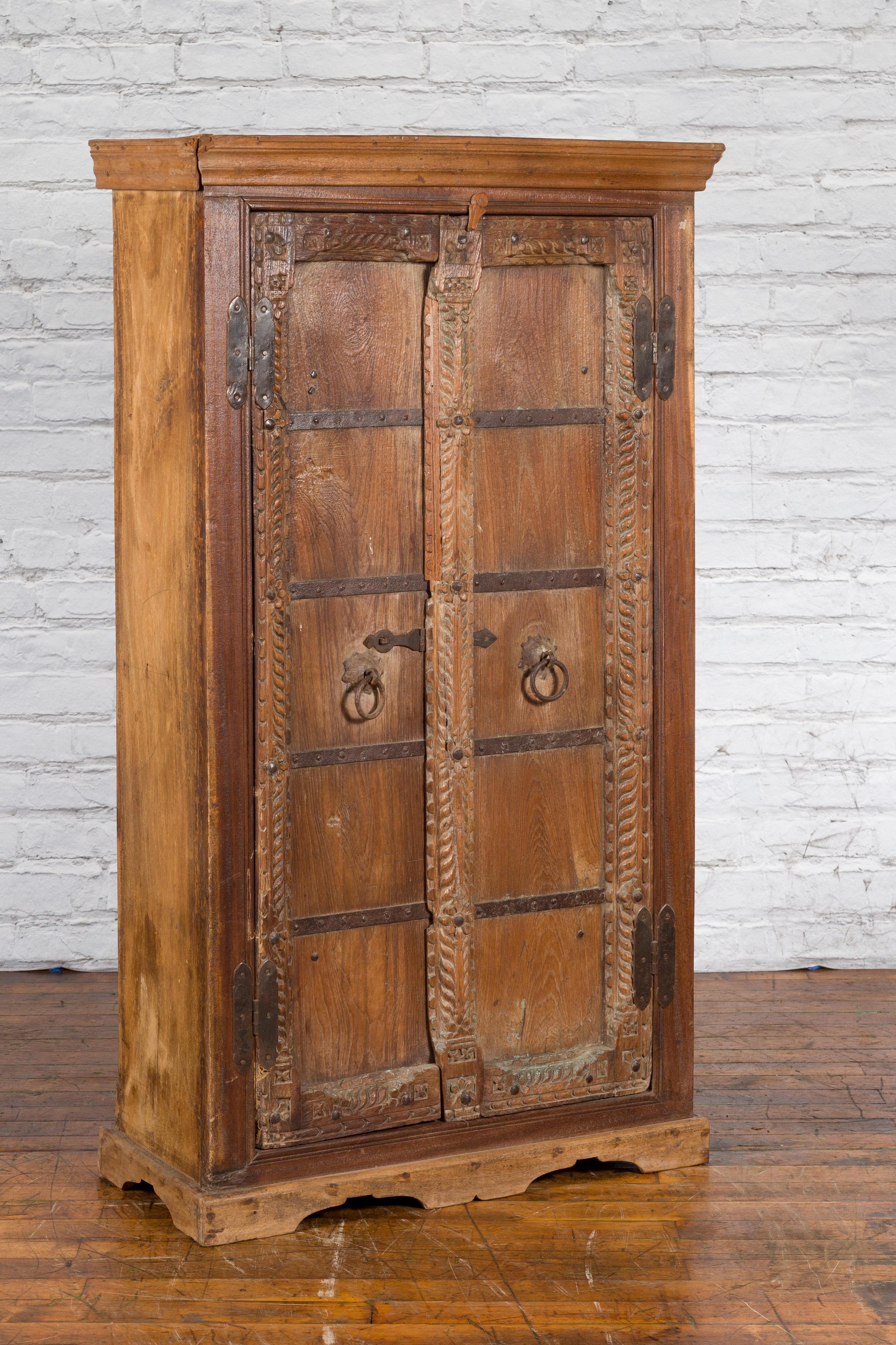 Antique 19th Century Indian Armoire with Metal Braces and Hand-Carved Décor In Good Condition In Yonkers, NY