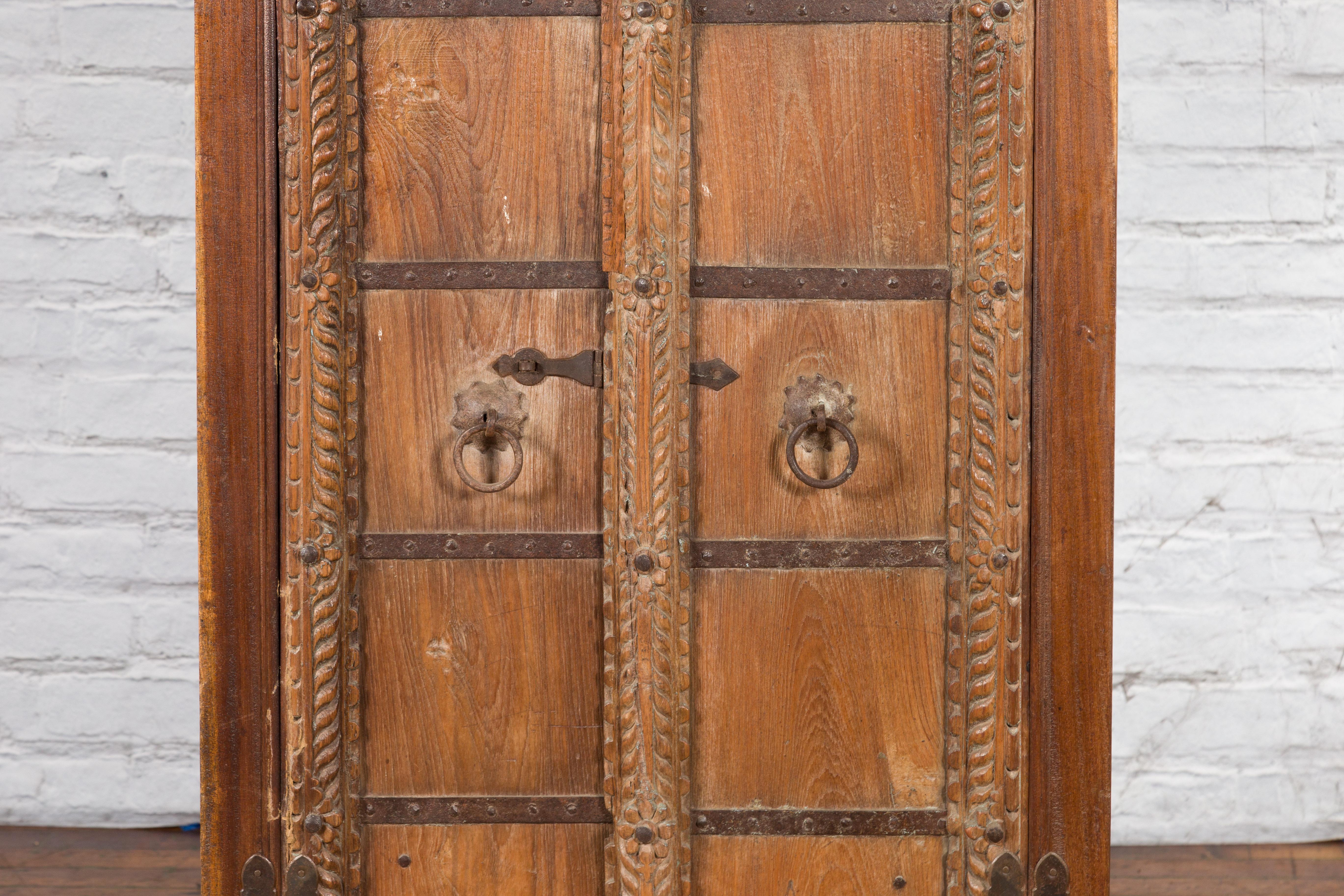 Antique 19th Century Indian Armoire with Metal Braces and Hand-Carved Décor 3