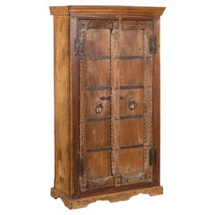 Antique 19th Century Indian Armoire with Metal Braces and Hand-Carved Décor