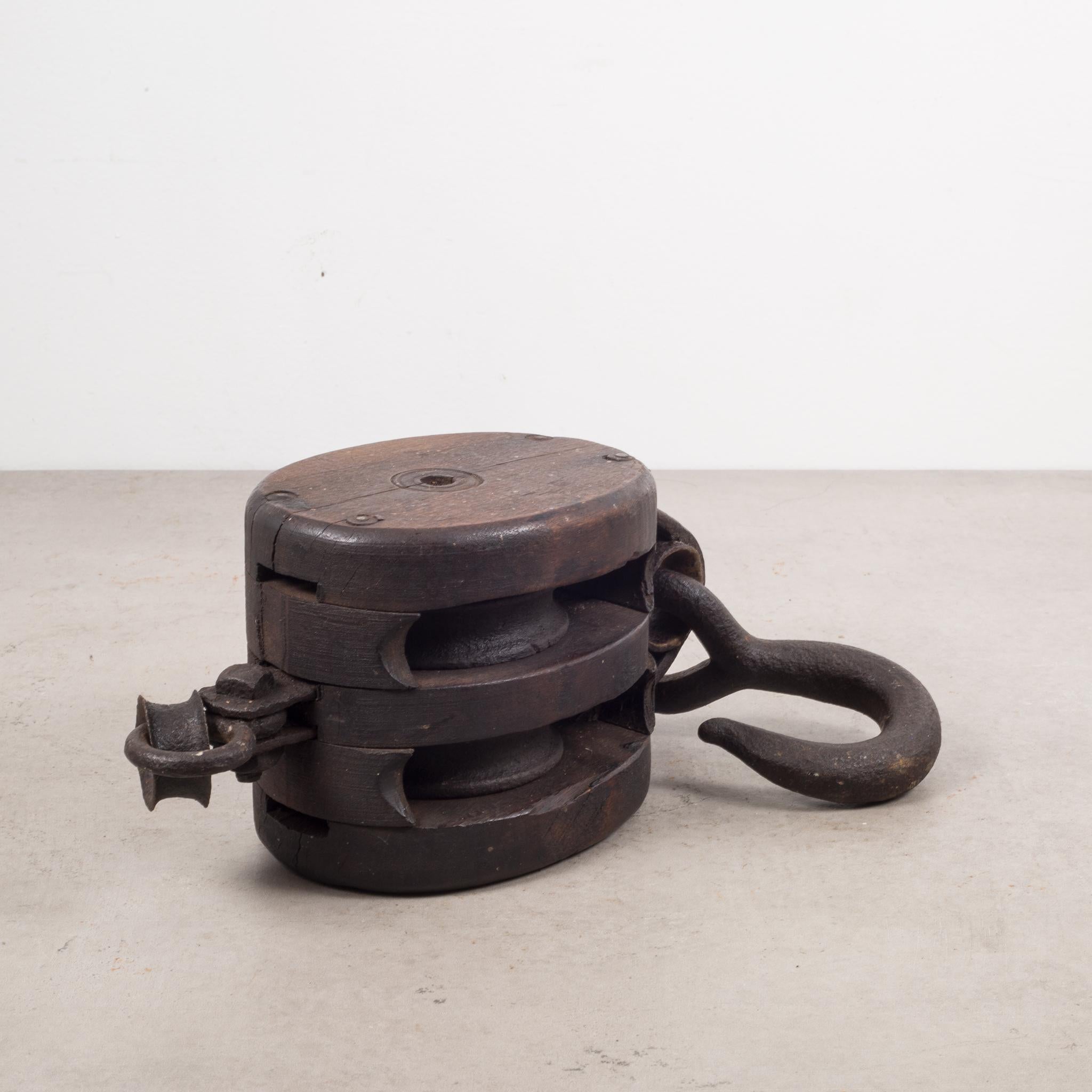 ABOUT

A 19th century wood and iron block and tackle with iron hook used to hoist the sails of a sailing ship.

 CREATOR Unknown.
 DATE OF MANUFACTURE c.1800s.
 MATERIALS AND TECHNIQUES Wood, Iron.
 CONDITION Good. Wear consistent with age