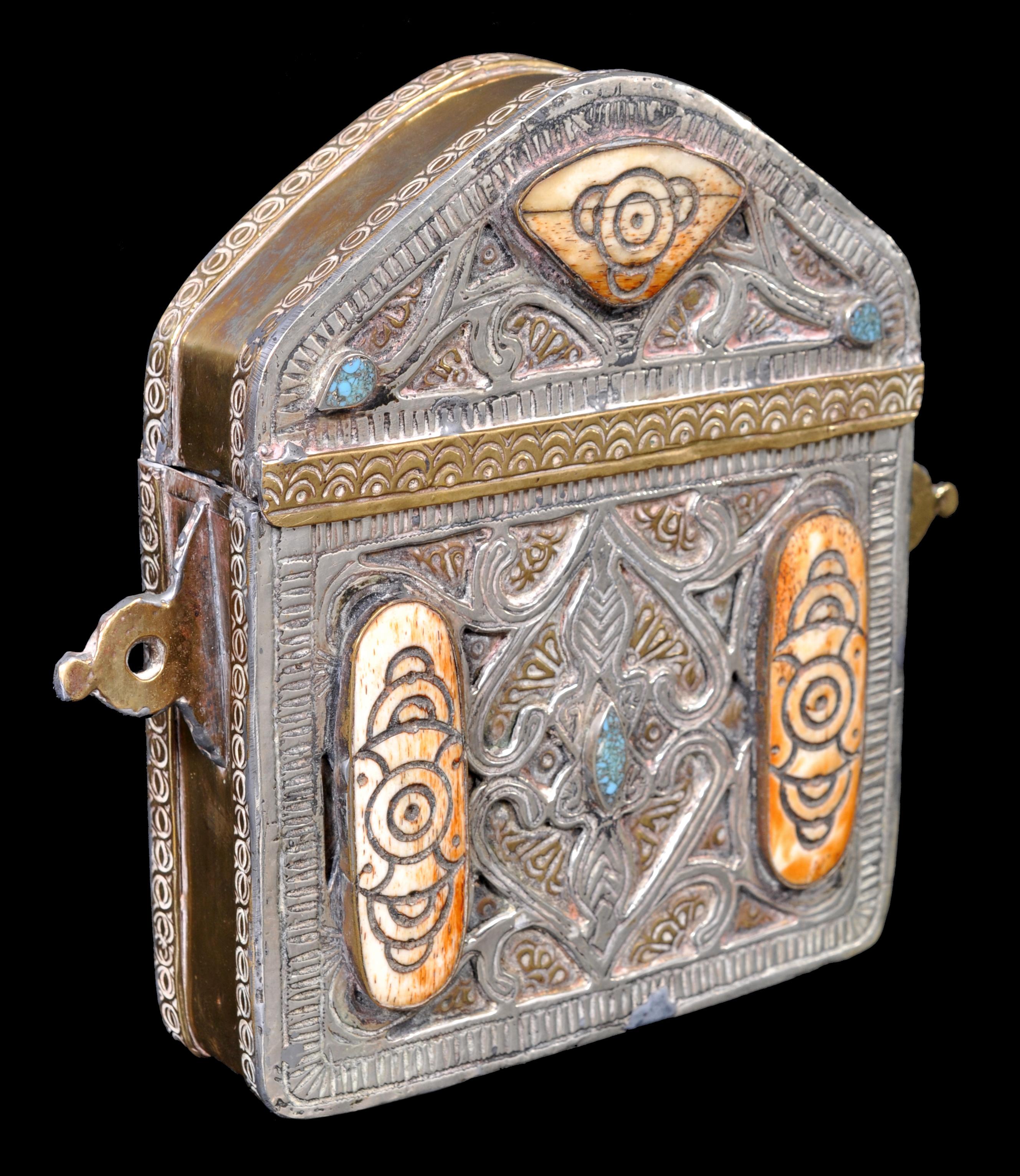 Antique 19th century Islamic brass and silver inlaid Koran/Qur'an case, circa 1890. Antique late 19th century Islamic holy Qur'an portable carrying case, made of brass and silver, most likely North African (Morocco). The hinged case ornately
