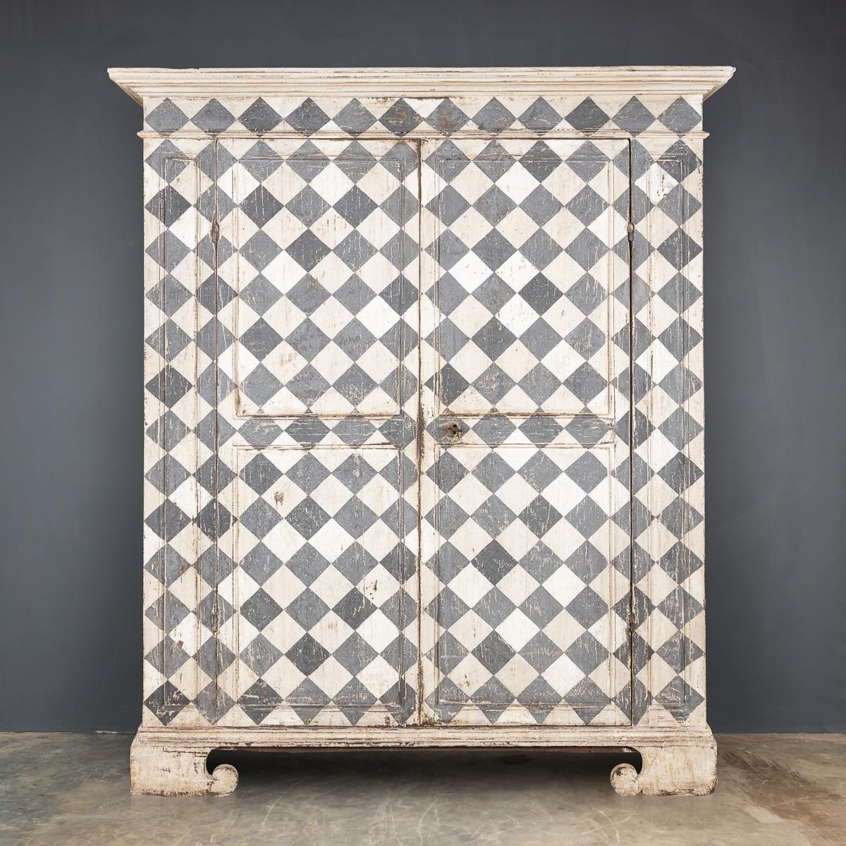 Antique mid-19th Century Italian beautiful and rustic painted pine armoire, decorated with a decorative pattern in white and grey, has its original lock and key.

CONDITION
In Good Condition - Wear consistent with age.

SIZE
Width: 166cm
Depth: