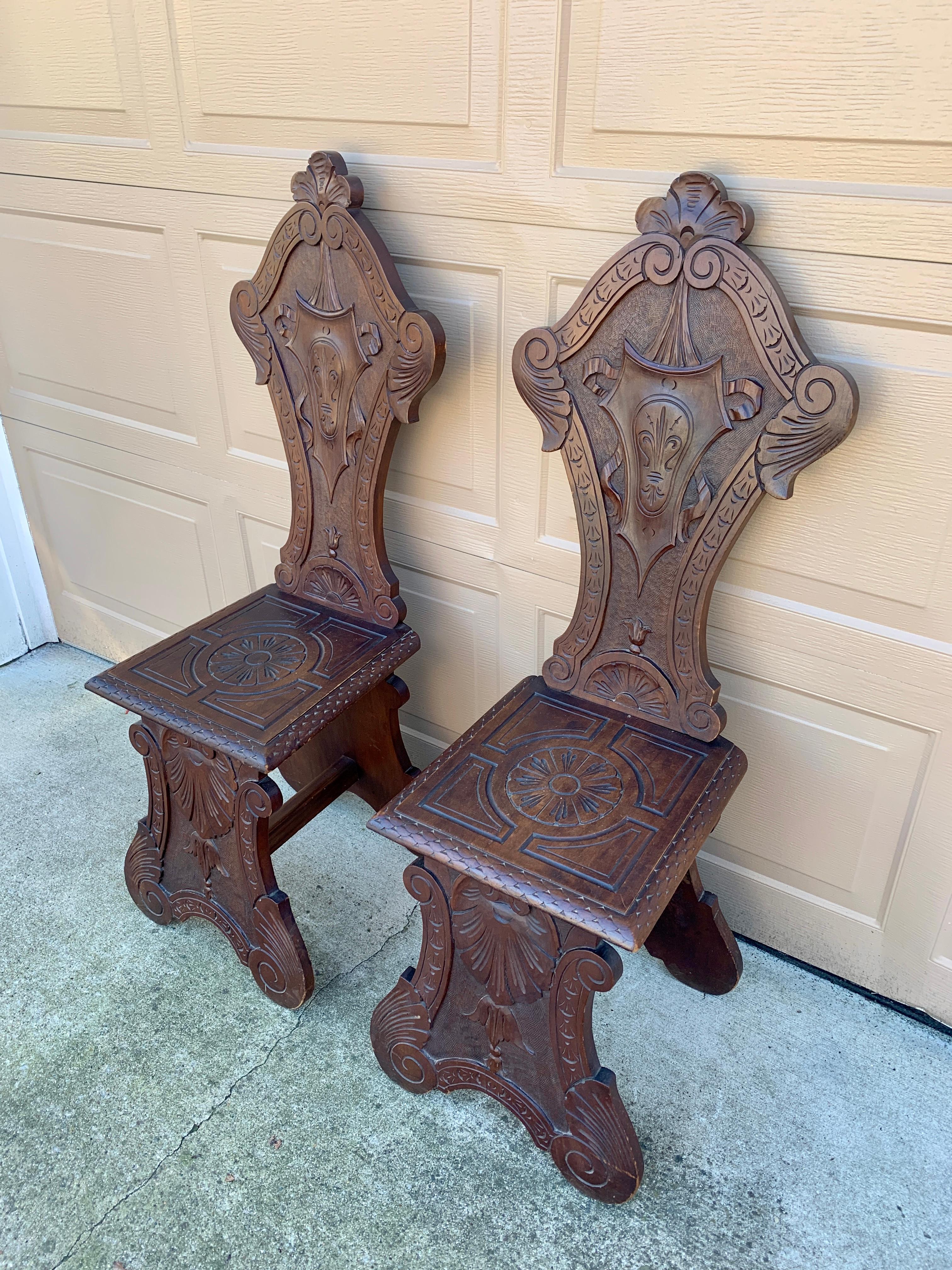 Antique 19th Century Italian Renaissance Hand Carved Walnut Hall Chairs, Pair In Good Condition For Sale In Elkhart, IN