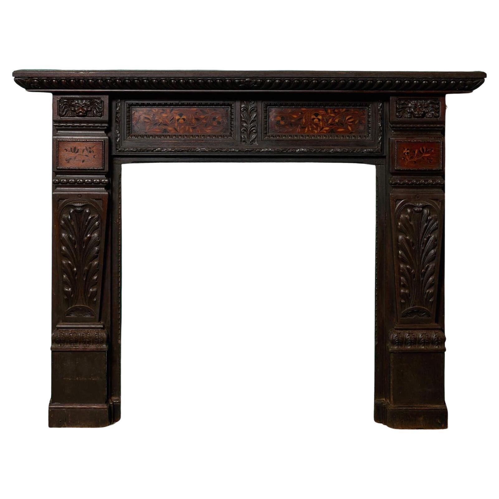 Cheminée ancienne en chêne sculpté Jacobean du 19e siècle