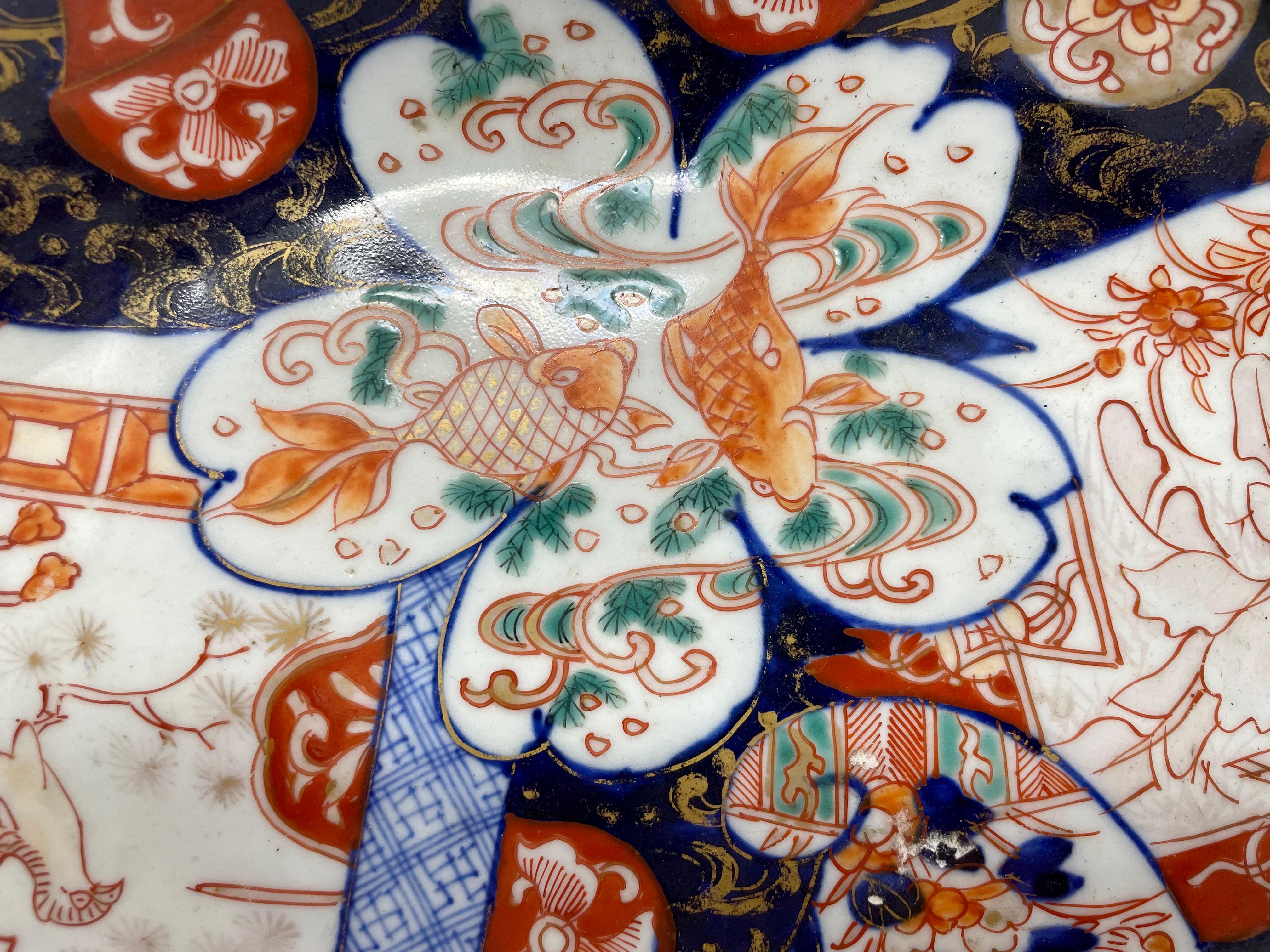 Antique 19th Century Japanese Imari Plate in the shape of a boat. Very stylisha and different!