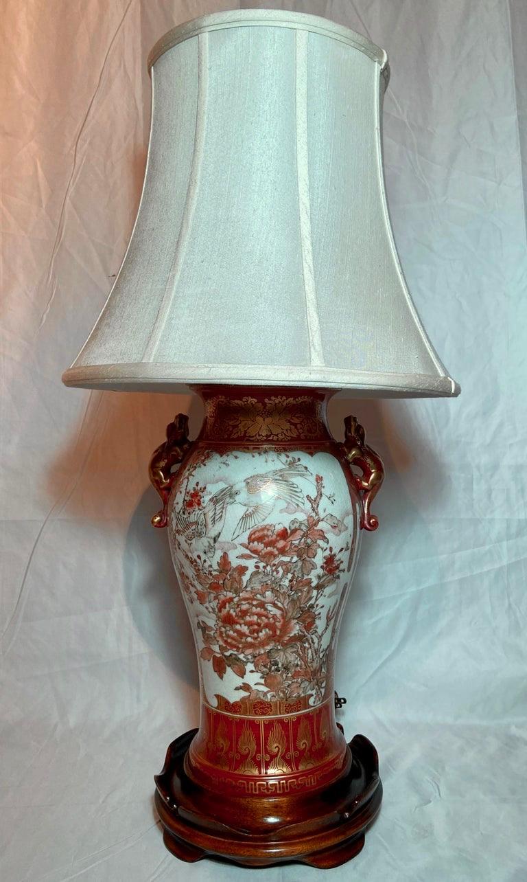 Pair antique 19th century Japanese red enamel porcelain with goldwork urns made into lamps.