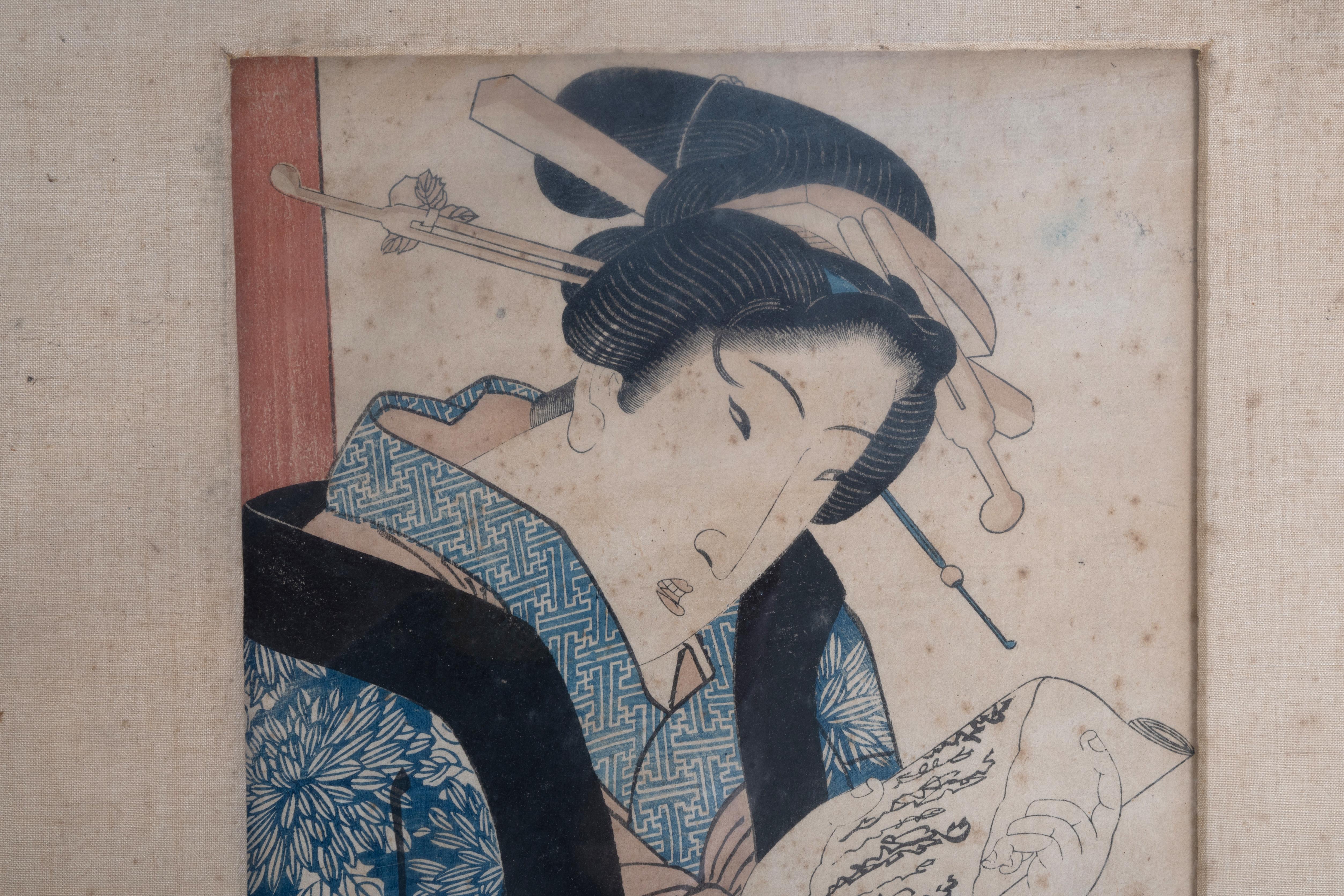 Antique 19th Century Japanese Framed Woodblock Print By Keisai Eisen 
'A beauty Reading A Letter'

Keisai Eisen (1790–1848) was a Japanese ukiyo-e artist who specialised in bijin-ga (pictures of beautiful women). 

Original and framed. In good