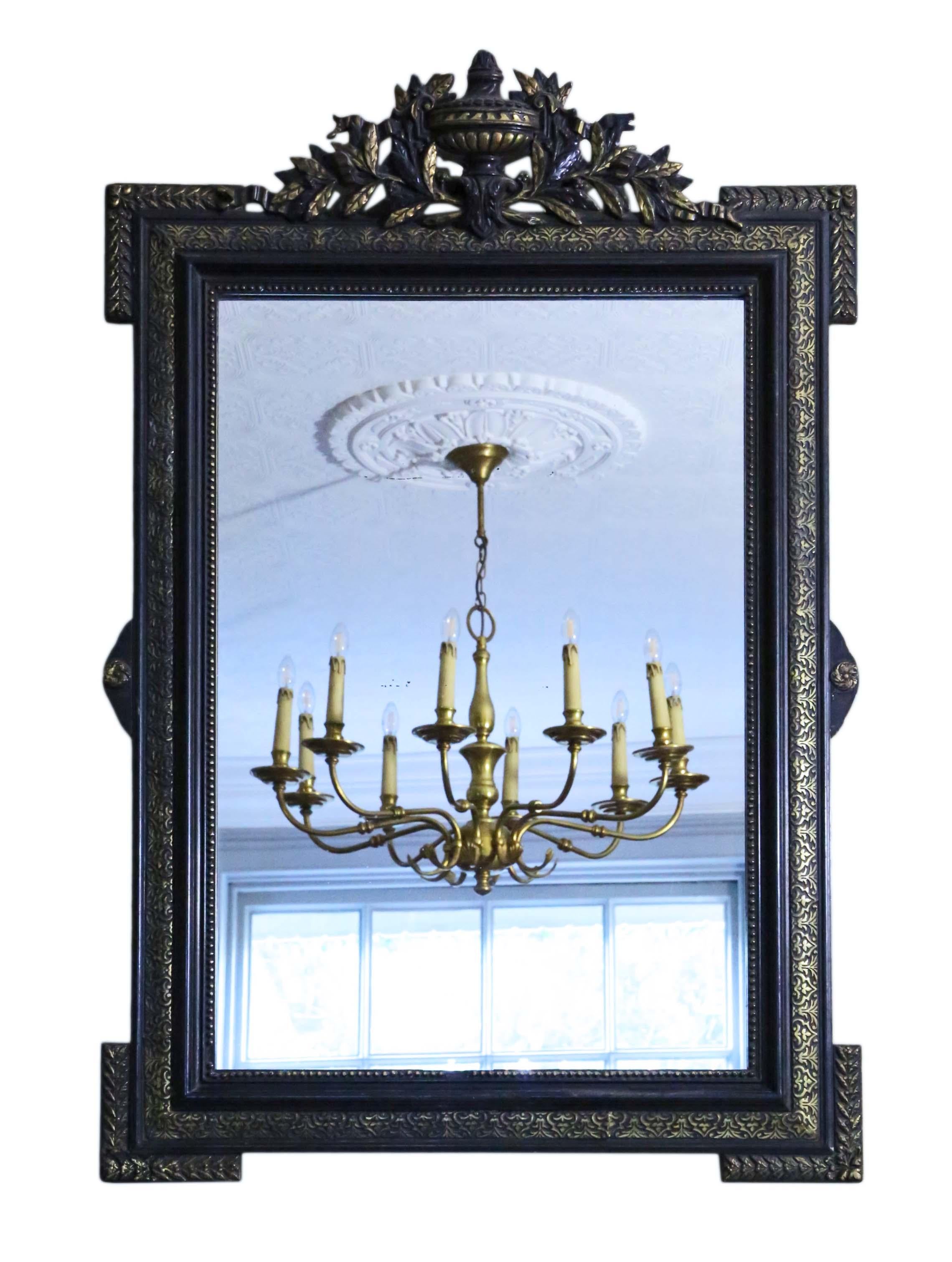 Antique 19th Century large quality ebonised and gilt wall mirror or overmantle.

An impressive rare find, that would look amazing in the right location. No loose joints or woodworm.

The original mirrored glass has light/medium oxidation and age