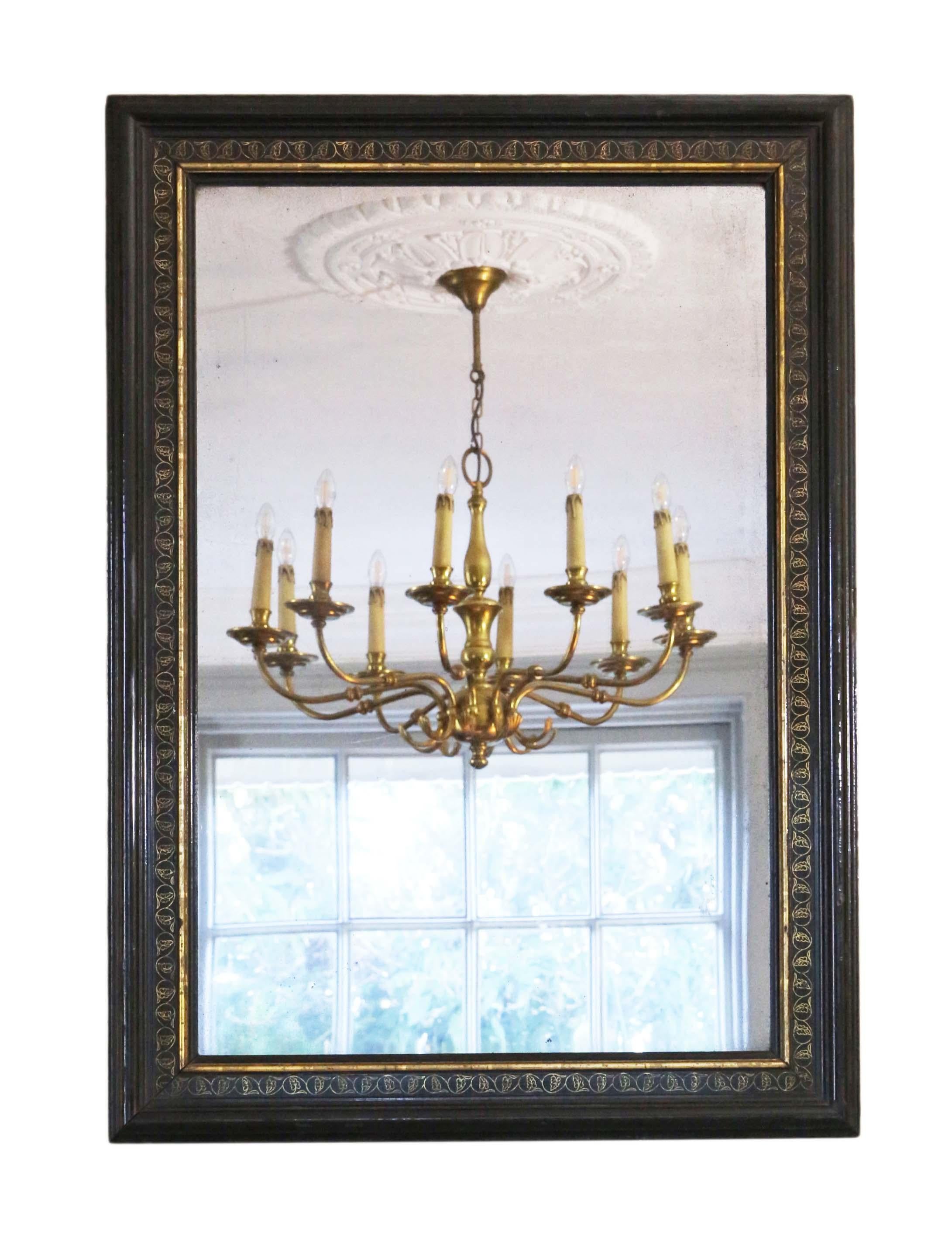 Antique 19th Century large quality ebonised and gilt wall mirror or overmantle.

An impressive rare find, that would look amazing in the right location. No loose joints or woodworm.

The original mirrored glass has light/medium oxidation and age