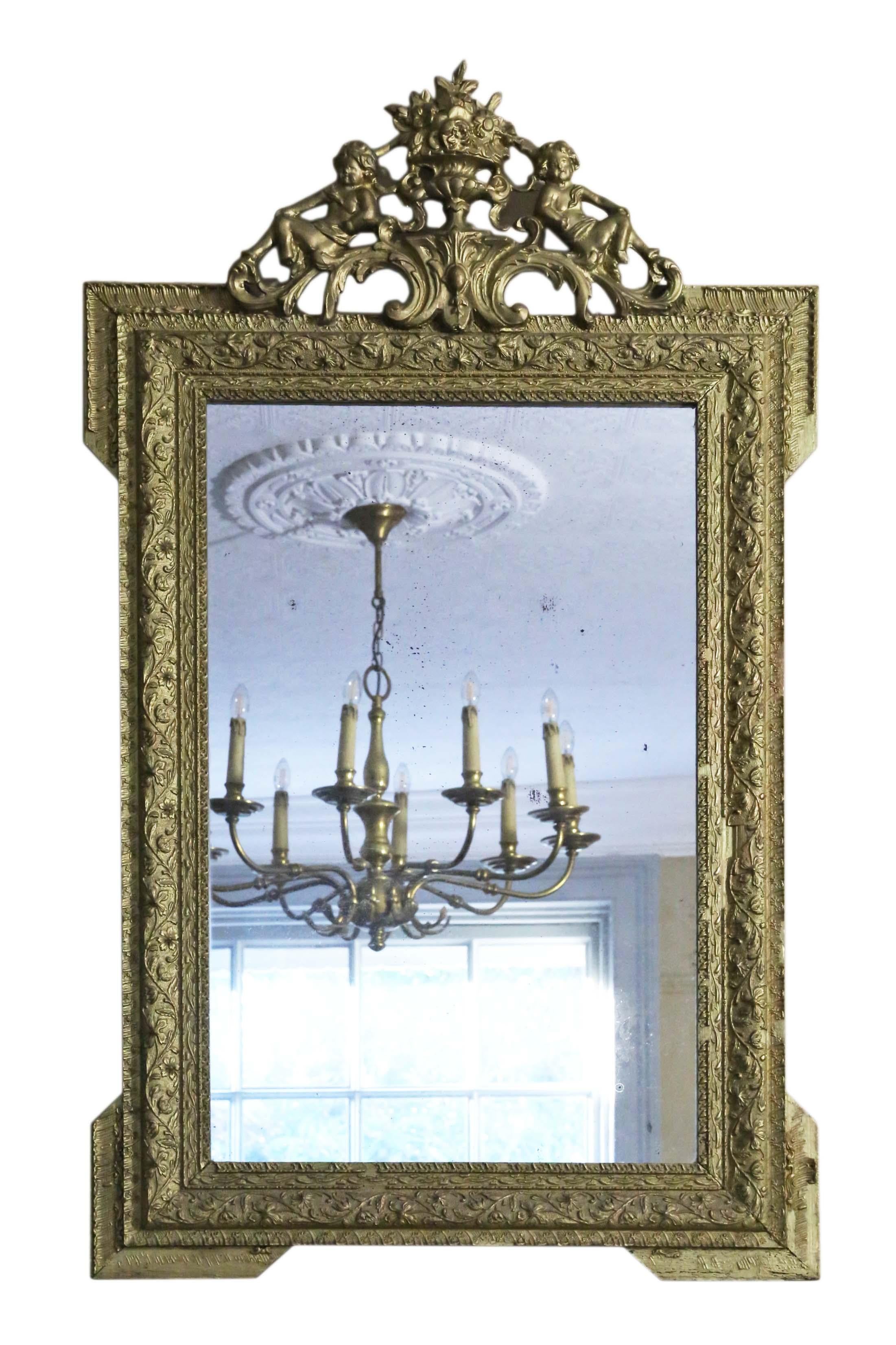 Antique 19th Century large quality gilt wall mirror or overmantle.

An impressive rare find, that would look amazing in the right location. No loose joints.

The original mirrored glass has light to medium oxidation. The frame has been