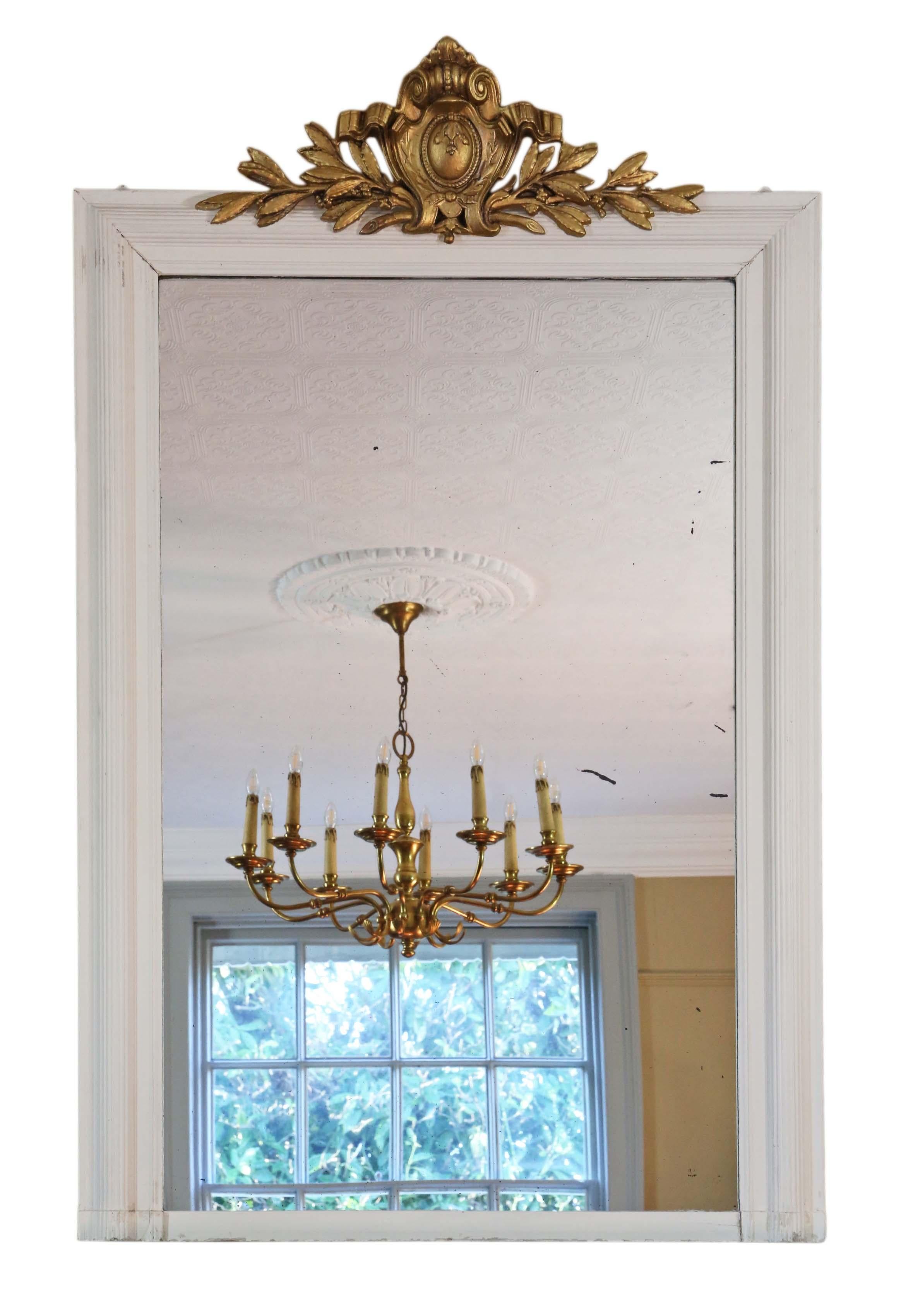 Antique 19th century large quality gilt and white overmantle wall mirror.

An impressive rare find, that would look amazing in the right location. No loose joints or woodworm.

The original mirrored bevel edge glass has light/medium oxidation,