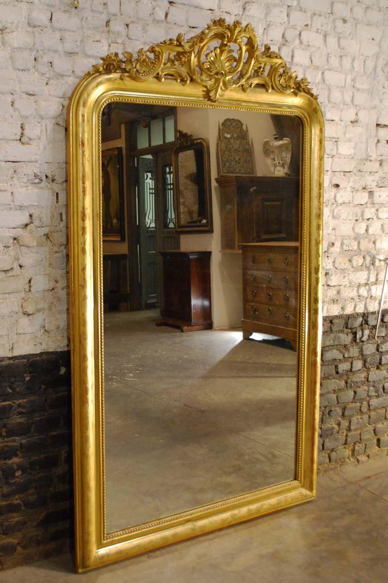 large gold gilded mirror