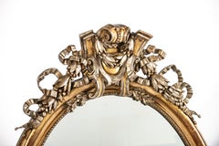 Antique 19th century large oval gold and silver leaf gilt French mirror