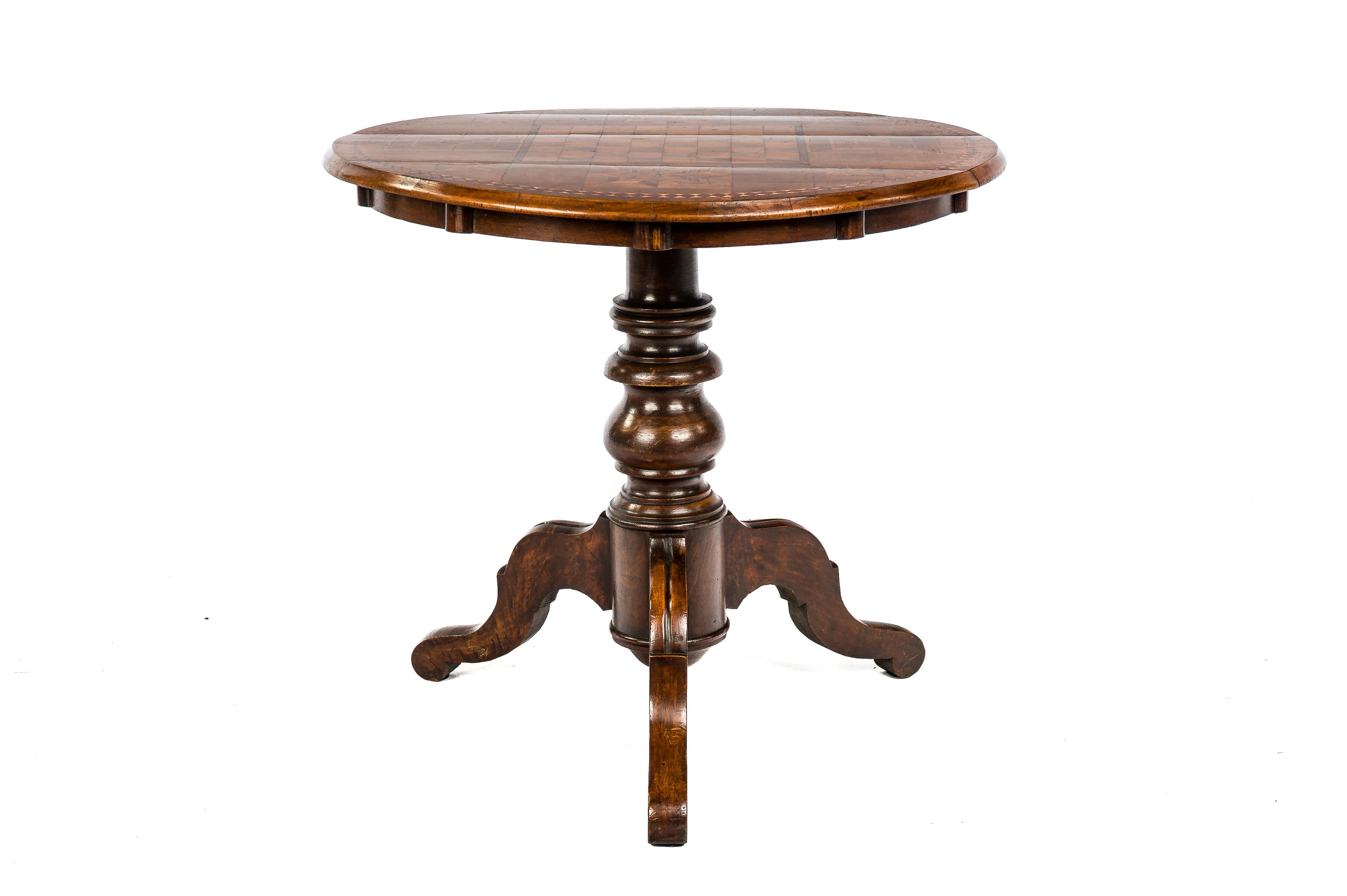 This beautiful Louis Philippe-style tilt-top game table was made in Italy circa 1870. The table was made in the finest quality walnut and features an exquisite inlaid top. The tabletop can be tilted in an upright position so it takes less space and