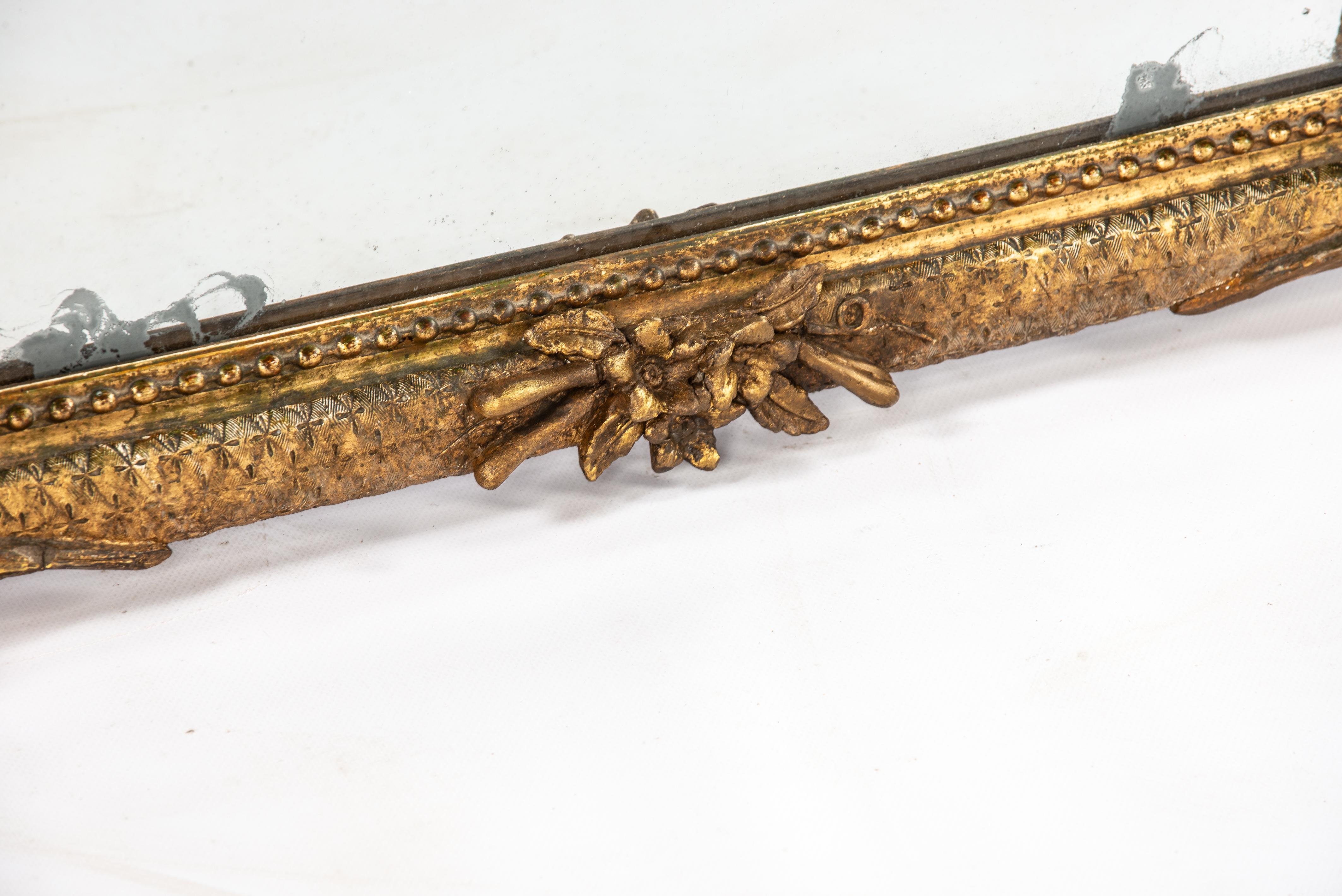 19th Century Antique 19th century Louis XVI gold leaf gilt French Pier mirror with crest For Sale