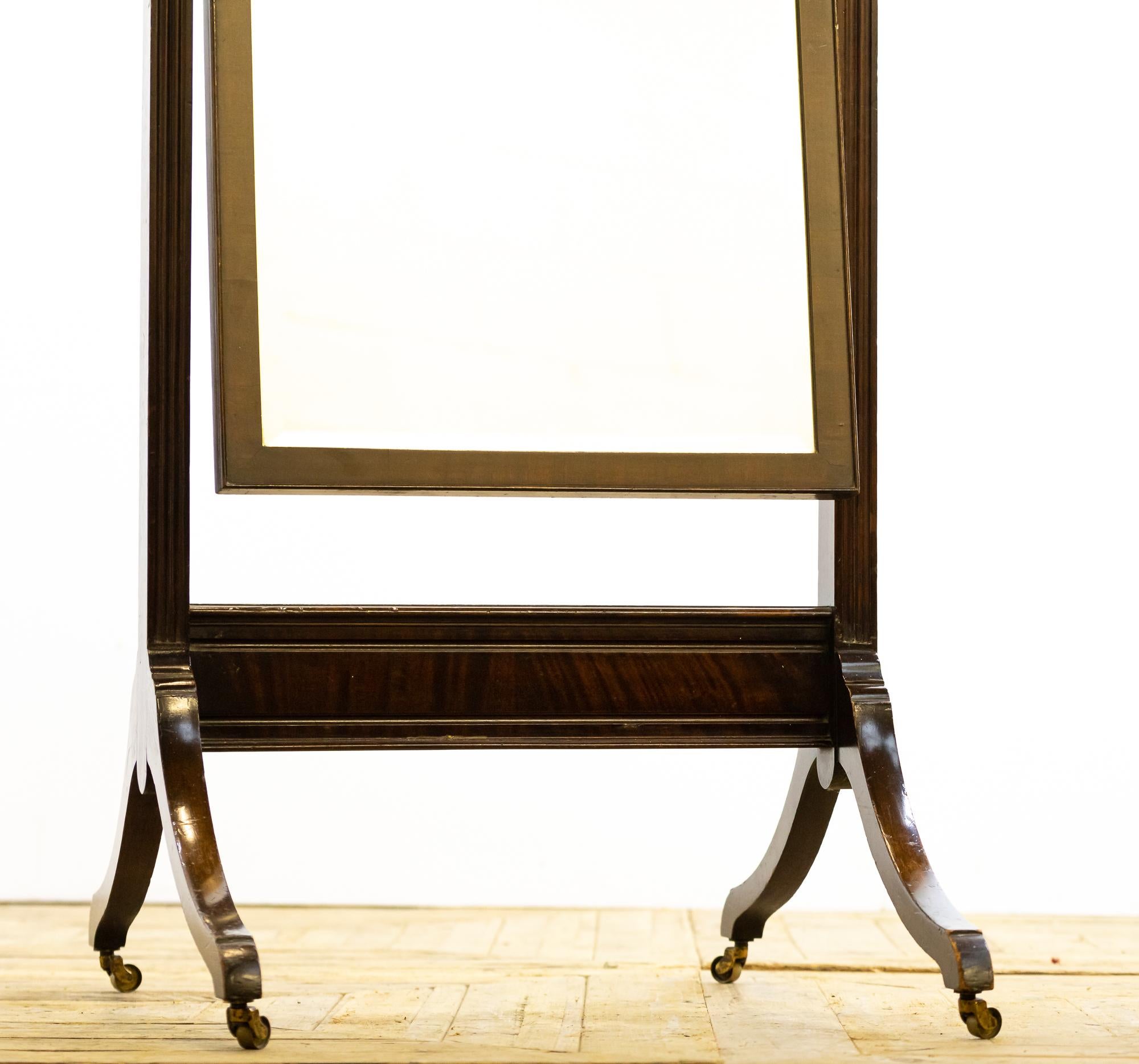 A lovely 19th century cheval mirror of small proportions.