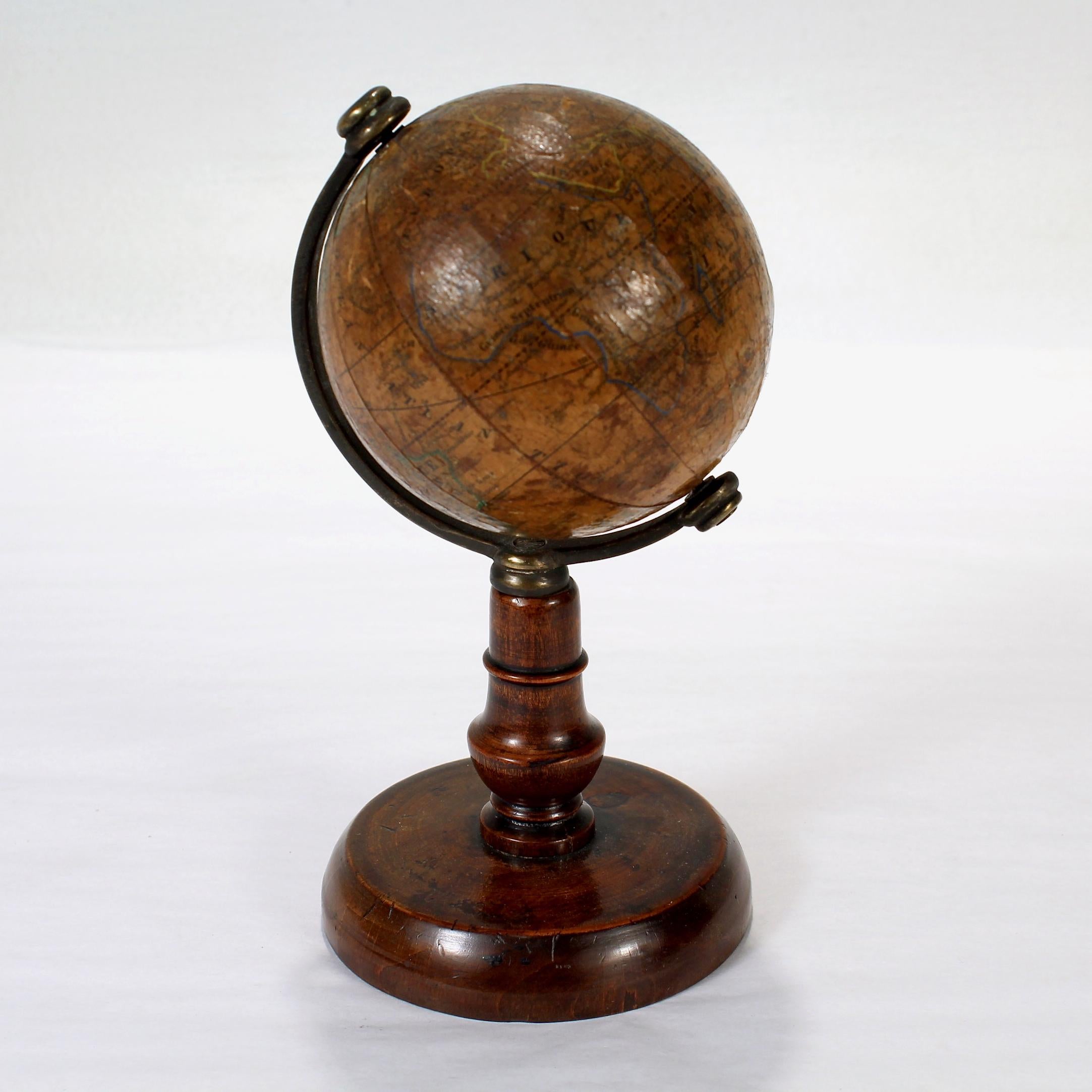 Allemand Globe terrestre miniature ancien du 19e siècle, édition française, par C.I.C. en vente