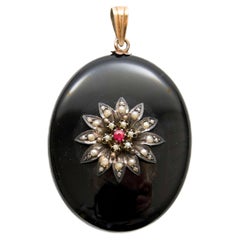 Antique 19th Century Onyx, Seed Pearl and Ruby Locket Pendant Antique 19th Century Onyx, Seed Pearl and Ruby Locket Pendant