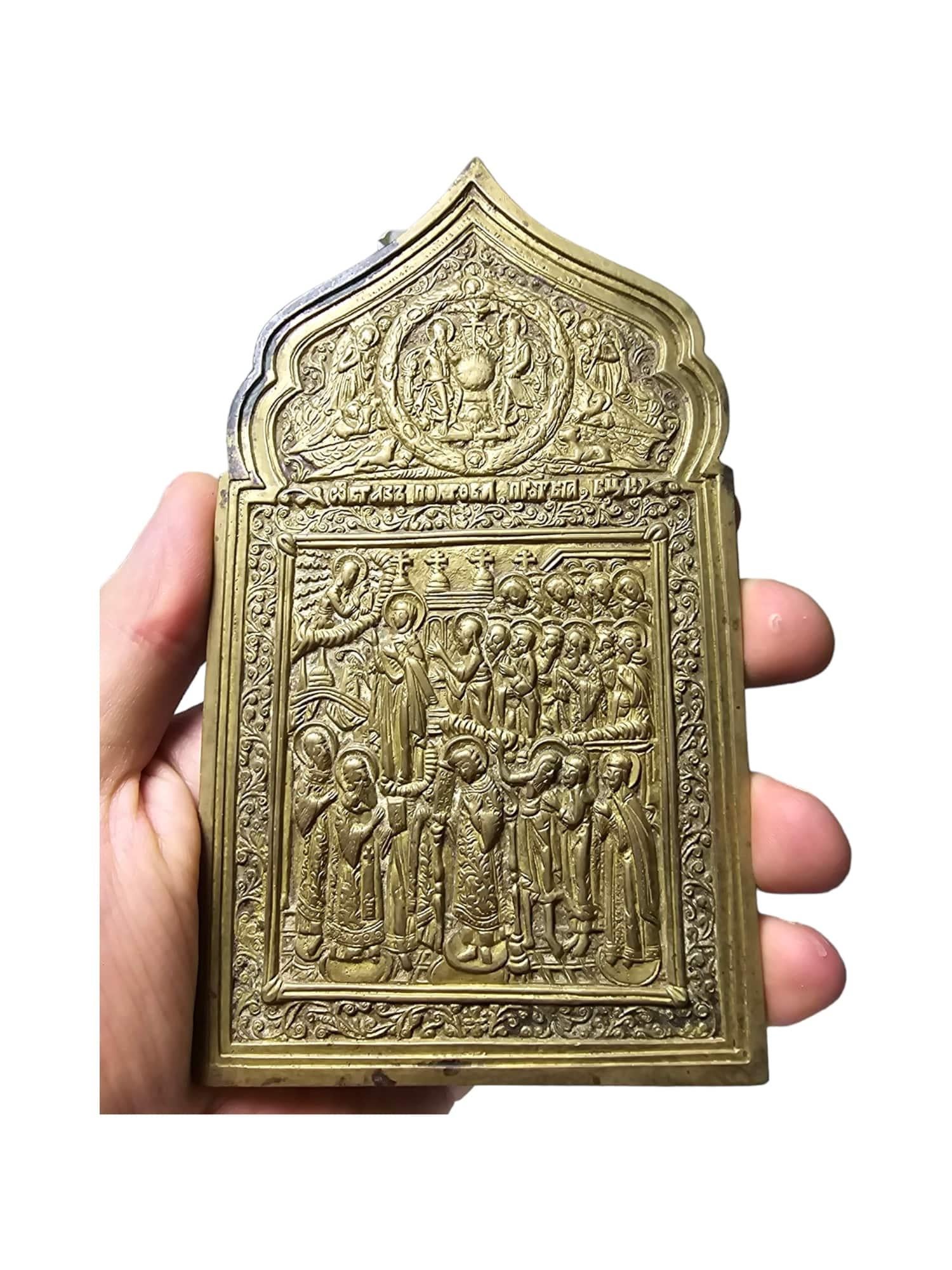 This antique 19th-century travel icon is crafted from bronze , giving it exceptional beauty and durability. Orthodox travel icons were used by the faithful to carry a sacred representation with them during their journeys, offering protection and a