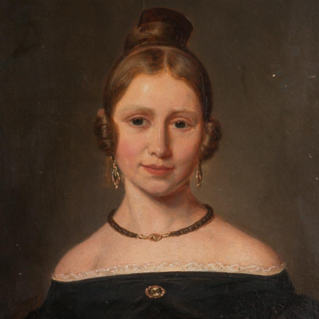This lovely young woman is portrayed in great detail, from the lace trim on her period black satin dress to the lovely earrings and broach she wears. Note her youthful, rosy cheeks and the gentle gaze in her eyes. This sweet portrait contains an
