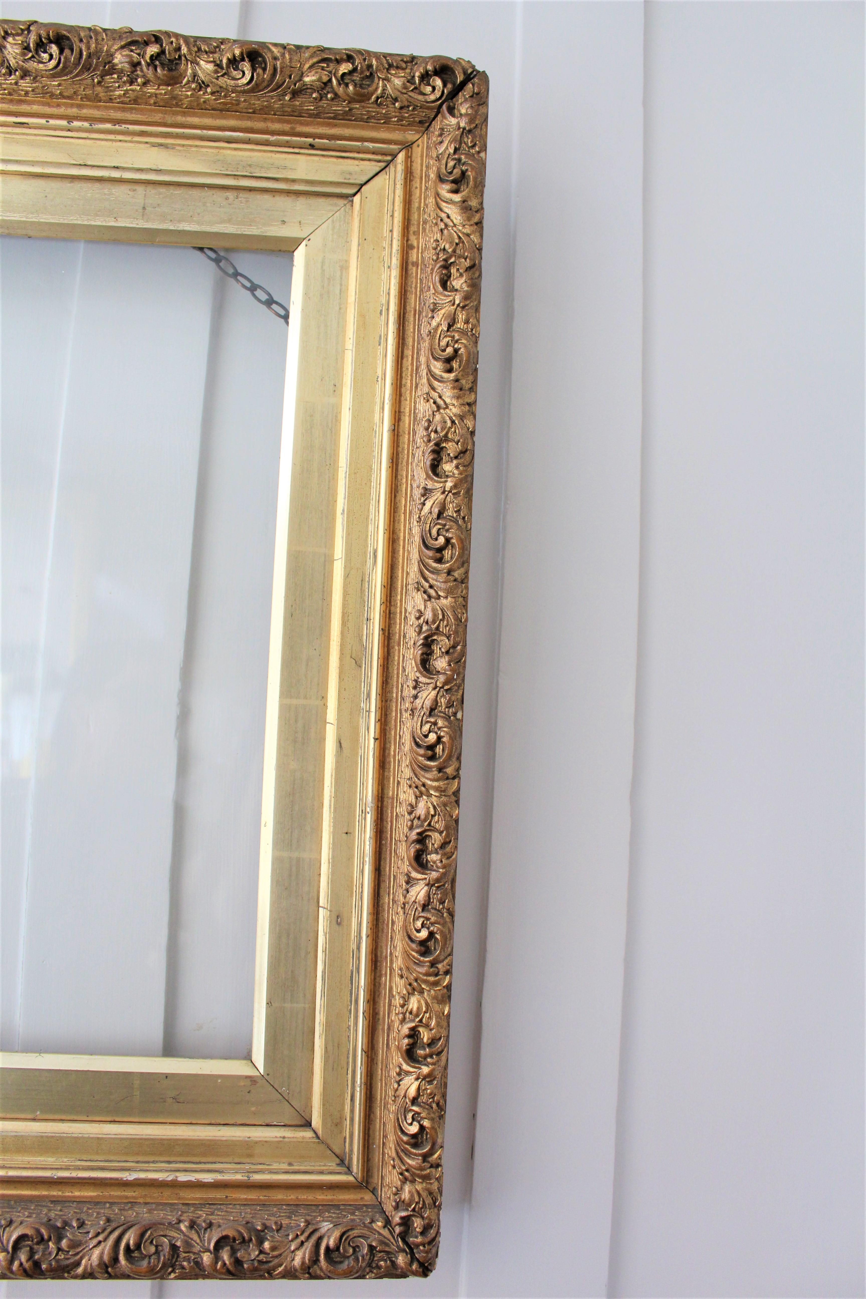 Gold Plate Antique 19th Century Ornate Carved Foliate Giltwood Photo Picture Frame Rippled For Sale