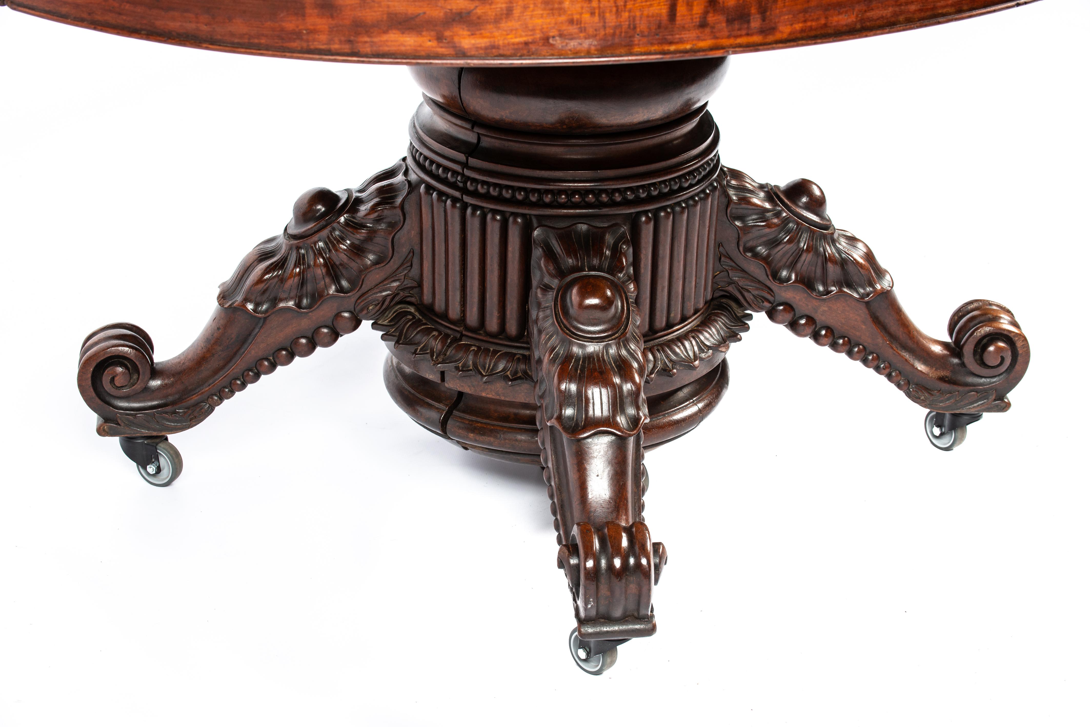 Antique 19th-century oval extendible French warm brown mahogany dining table. For Sale 11