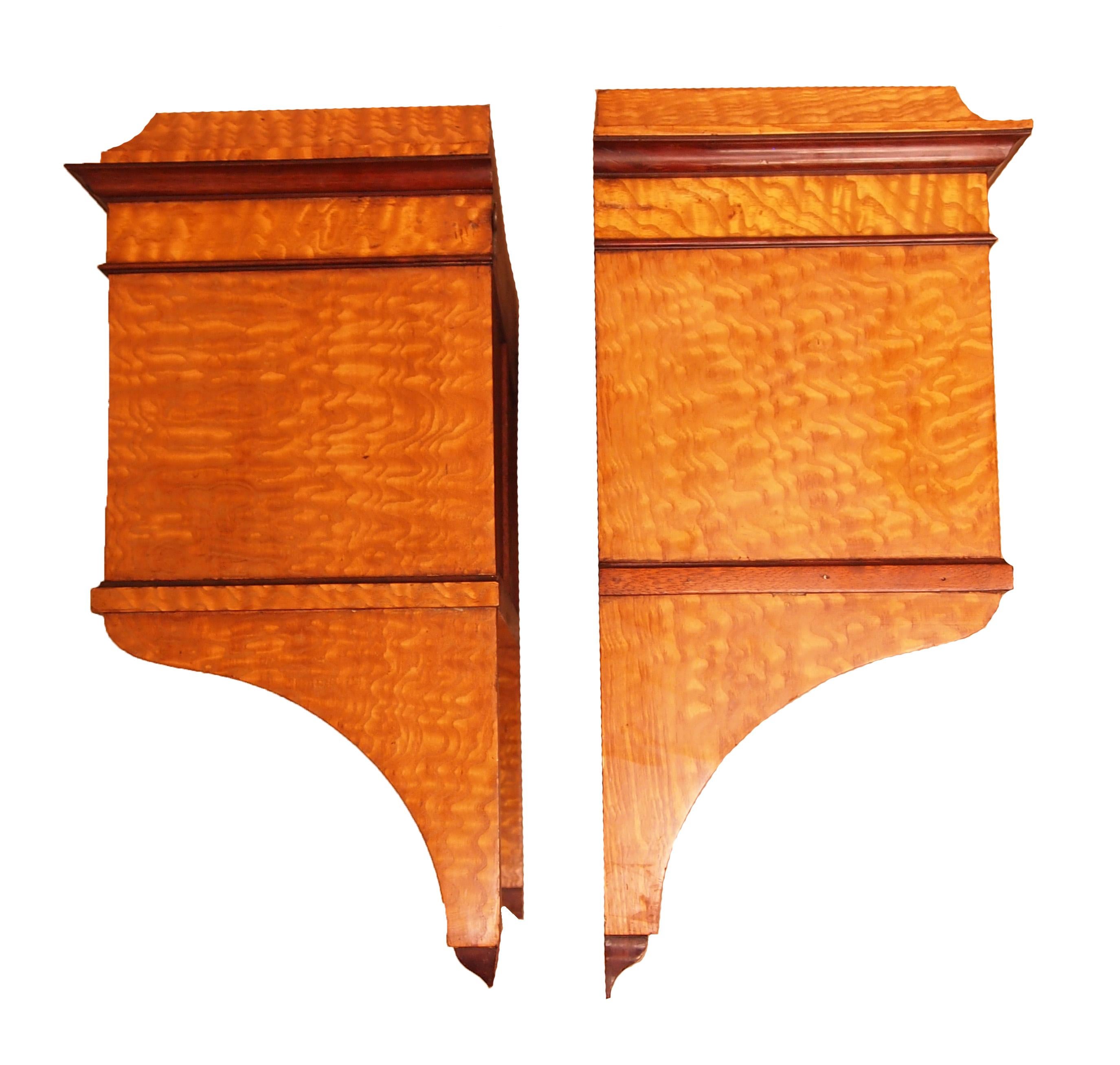 A very rare and attractive pair of good quality
Hungarian ash wall hanging cupboards having
elegant galleried tops above pairs of panelled doors.