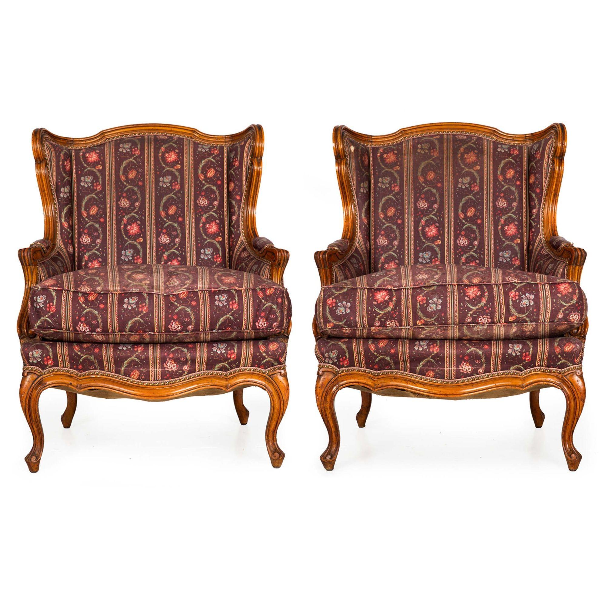 PAIR OF LOUIS XV STYLE PATINATED BEECHWOOD WINGBACK BERGERES
Circa late 19th century
Item # 306XGL21P 

A good pair of wingback bergere arm chairs in the Louis XV style, they feature beautifully patinated carved beechwood frames with reeded moldings