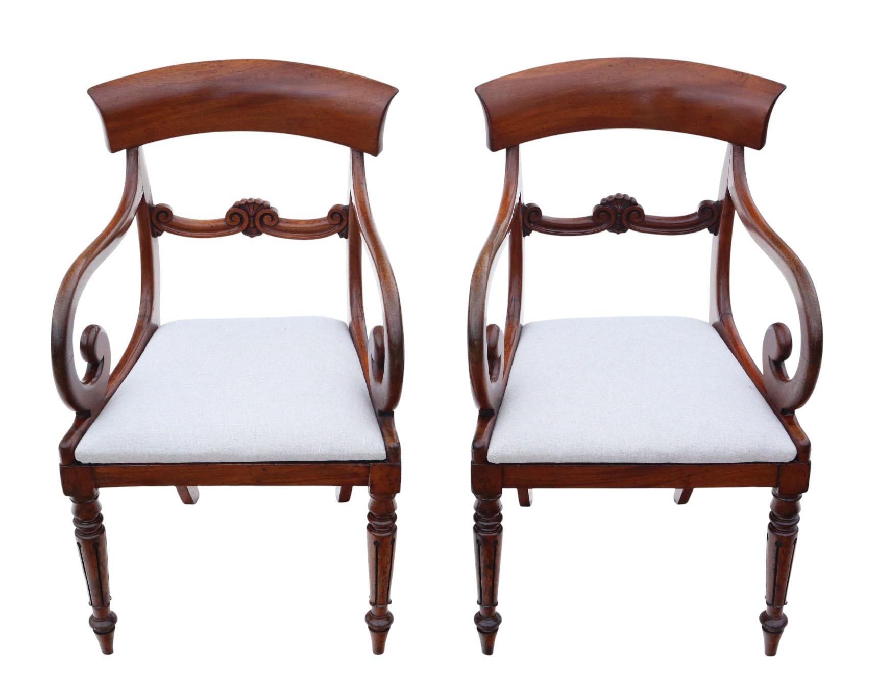 Antique 19th Century Pair of Mahogany Scroll-Arm Elbow Carver Dining Chairs – Fine Quality

A rare decorative find, this pair of 19th-century mahogany scroll-arm carver dining chairs is full of age, colour, and patina. Featuring traditional inverted