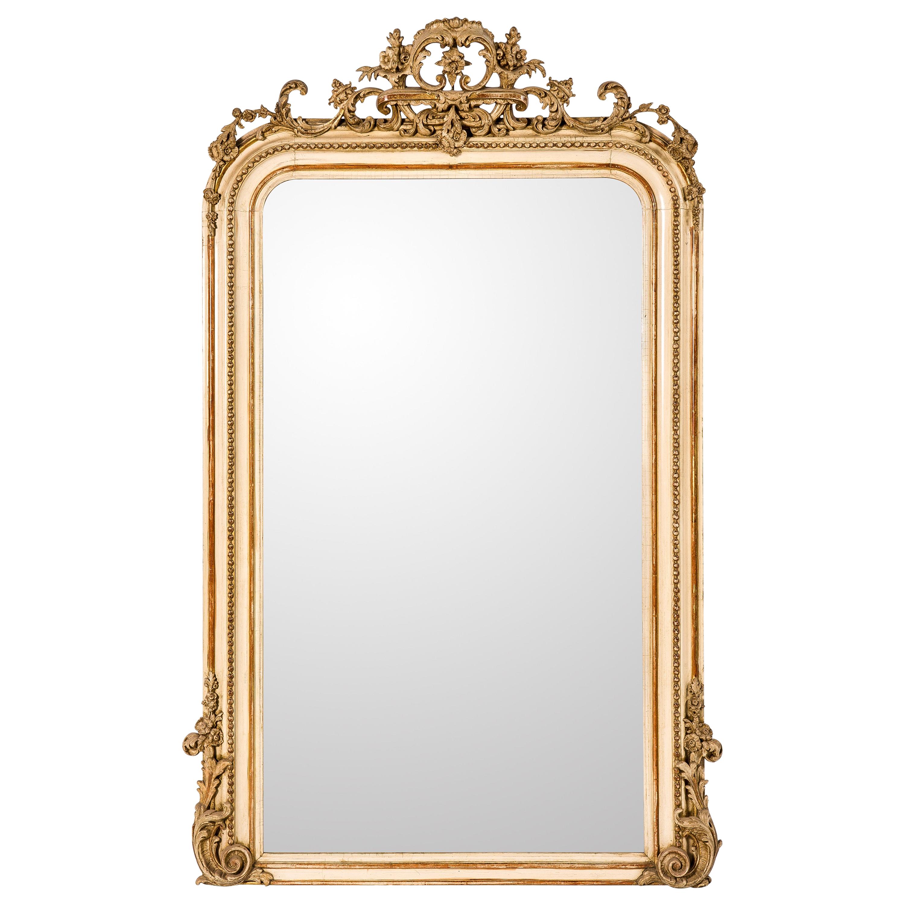Antique 19th Century Pale French Louis Philippe Mirror with an Ornate Crest For Sale