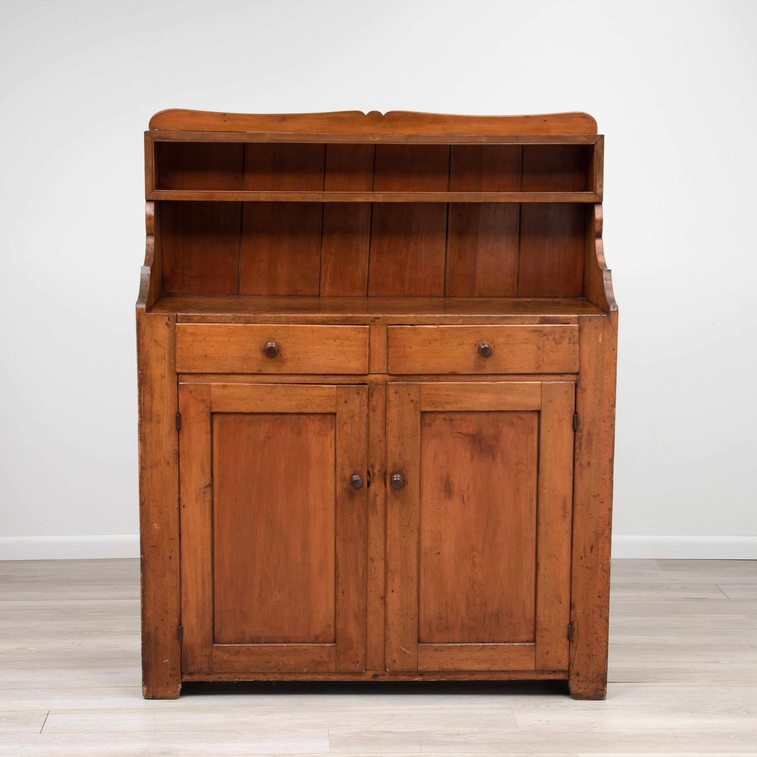 A Pennsylvania step back pine jelly cupboard with a fantastic patina. The work shelf is 41” tall...

A solid large stately piece, with great storage. Perfect for a country farmhouse style kitchen, or display in your living space. 
