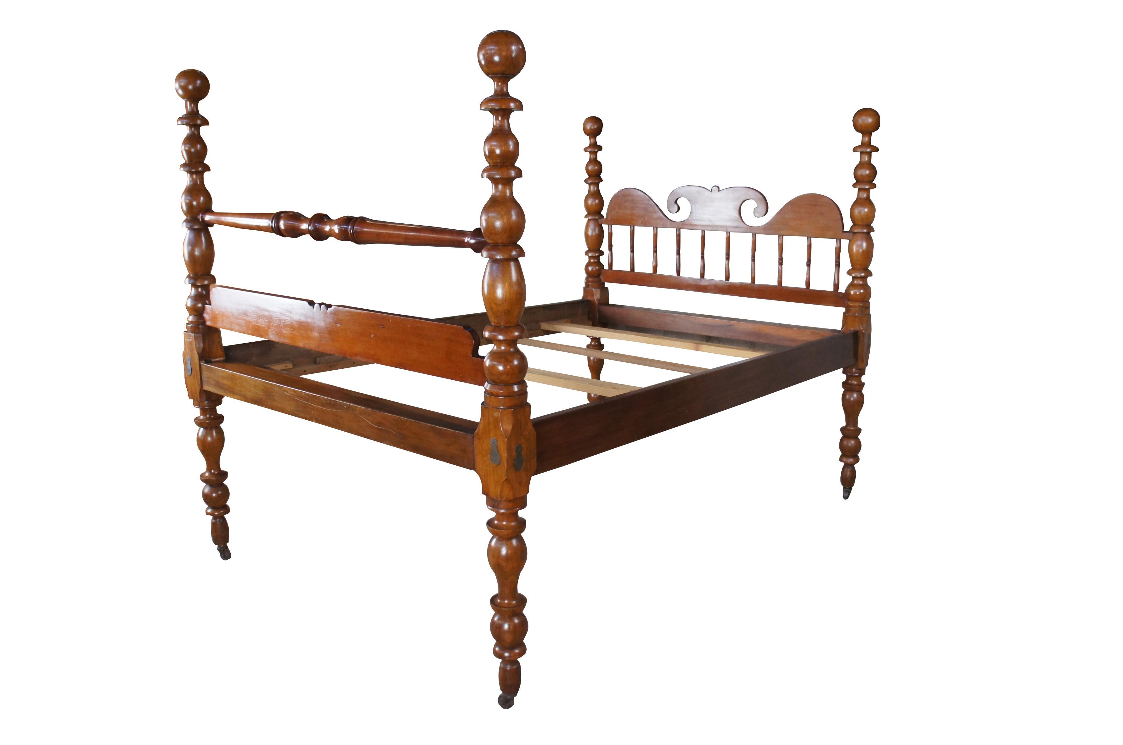 Antique 19th century cannonball post bed.  Made of cherry with traditional Colonial styling that features reticulated headboard with serpentine crest and tall turned posts.

Dimensions:
60
