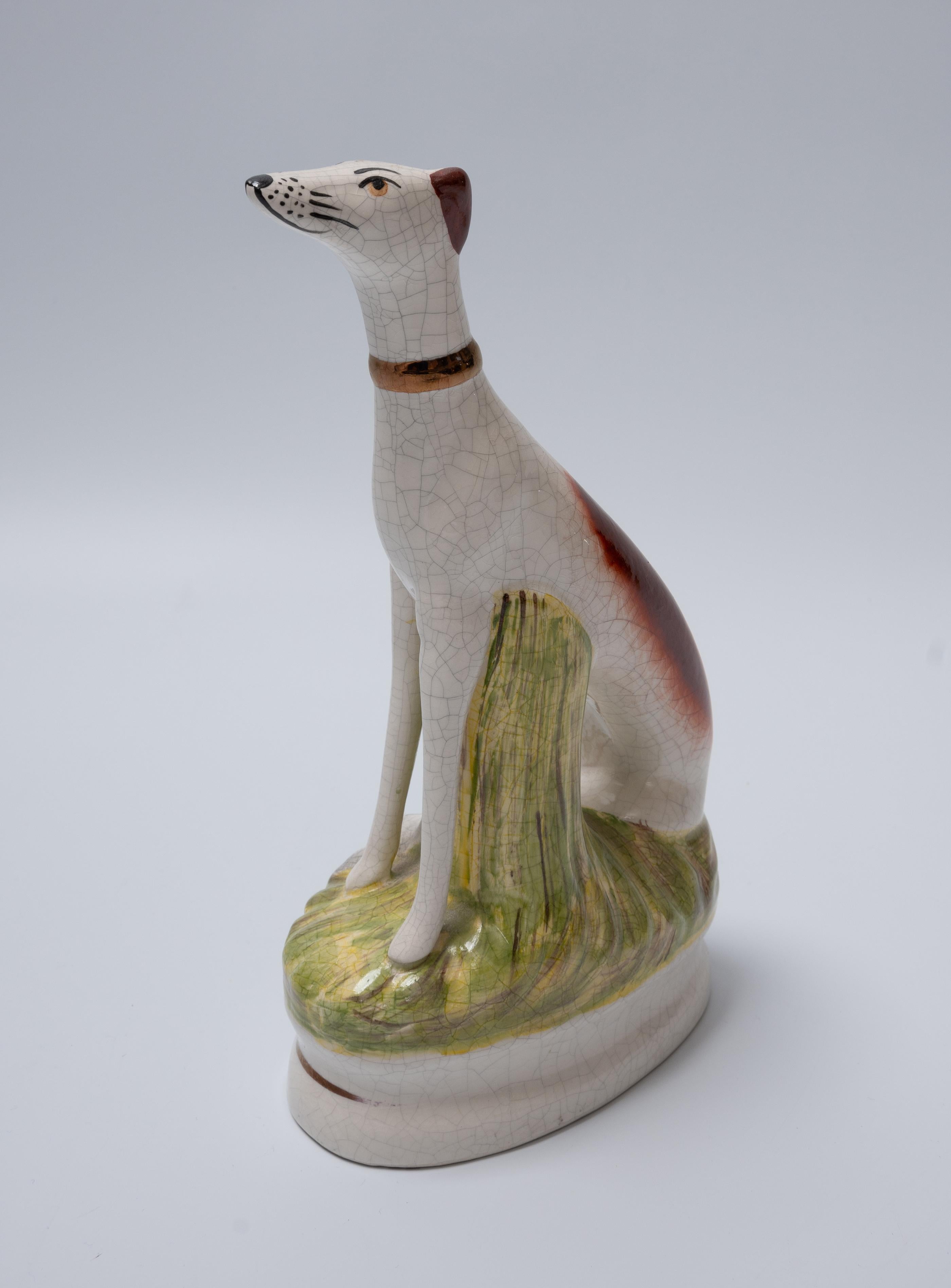 Antique 19th Century Porcelain Staffordshire Ware Hound 
By William Kent C.1850
A superb hand painted elegant hound figure presented in very good condition commensurate of age. Minor rubbing to gilding, and crazing to porcelain (please refer to