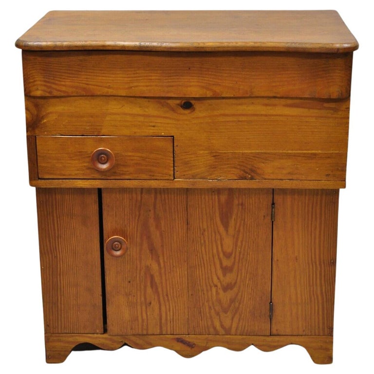 https://a.1stdibscdn.com/antique-19th-century-primitive-colonial-pine-wood-flip-top-washstand-cabinet-for-sale/f_9341/f_321287821673278185866/f_32128782_1673278186353_bg_processed.jpg?width=768