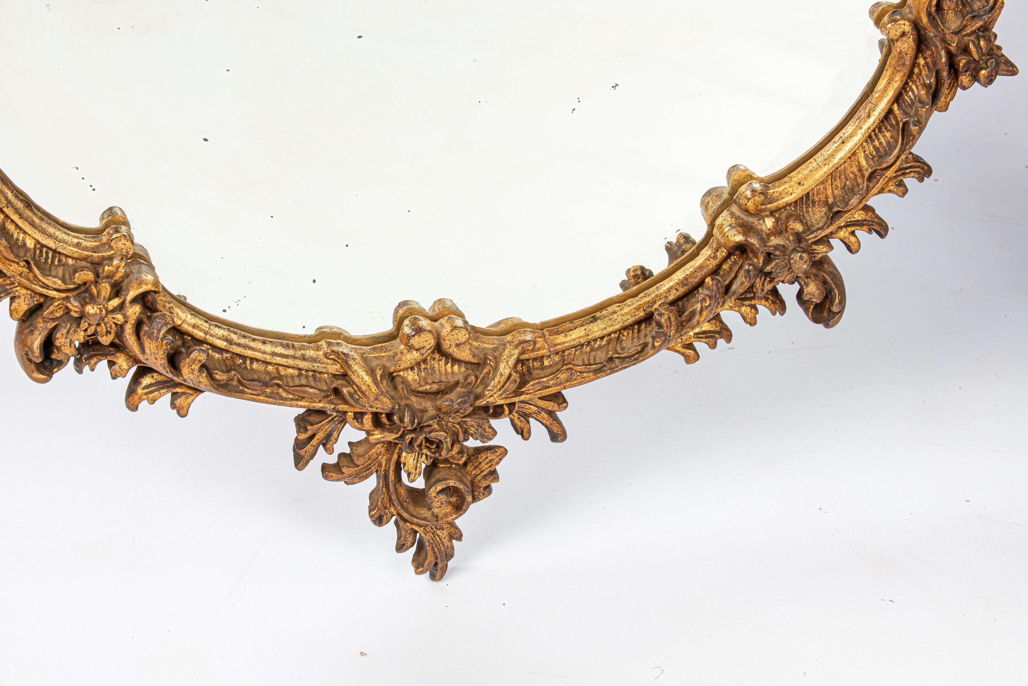 Gilt Antique 19th century round or circular gold leaf gilt French Rococo mirror For Sale
