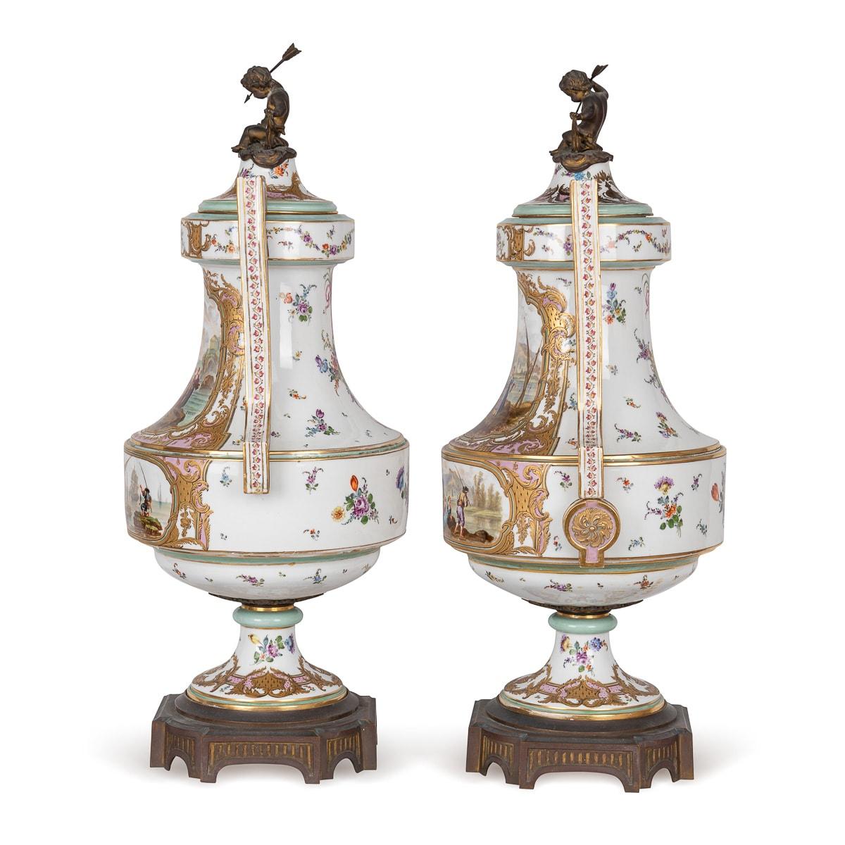 Antique 19th Century French Samson porcelain lidded vases feature intricate ormolu bronze mounts gracing both base and lid. The lids are crowned with cherub-shaped finials, adorned with delicate floral patterns cascading down to the base. Each vase