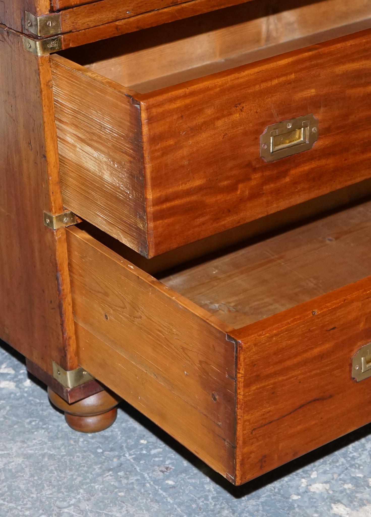
Antiques of London



A superb 19th-century satinwood military campaign chest of drawers, full of character and steeped in history. This fine example of campaign furniture was designed with practicality and portability in mind, making it a staple