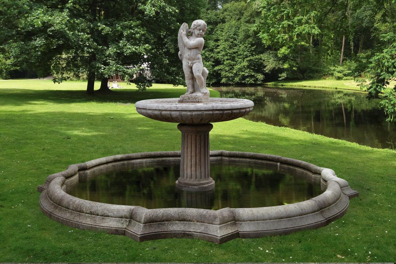 Antique 19th century sculpted decorative garden fountain. The fount is modelled as a young boy with a large decorative fish standing in a circular basin (diameter 120 cm) on a column shaped pedestal. The boy and inner basin are made out of 