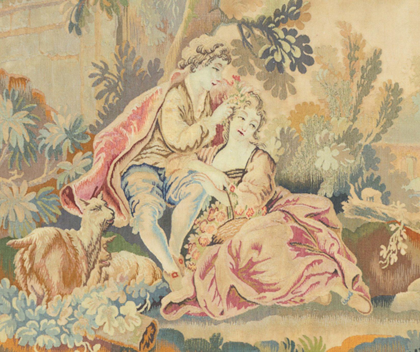 Antique 19th century French Aubusson Tapestry depicting young courtiers spending a leisurely afternoon sitting in the woods within the splendidly maintained verdant palatial grounds. It is a Classic example of the Aubusson style of the 19th century