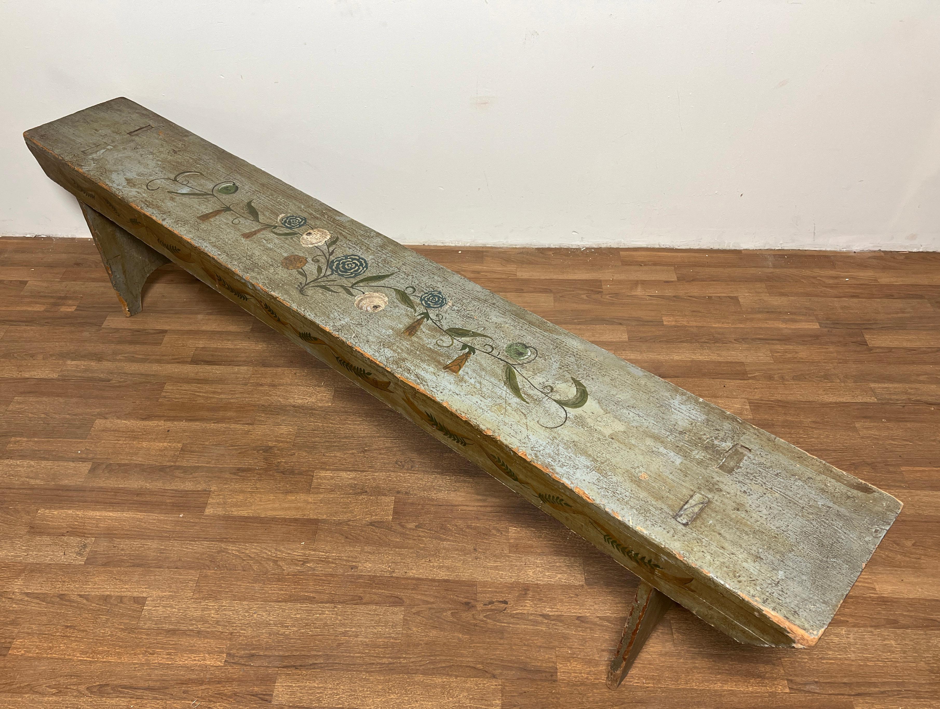 An antique pine bench hand painted in the Scandinavian rosemale tradition, circa 1800s.  Most likely Swedish.