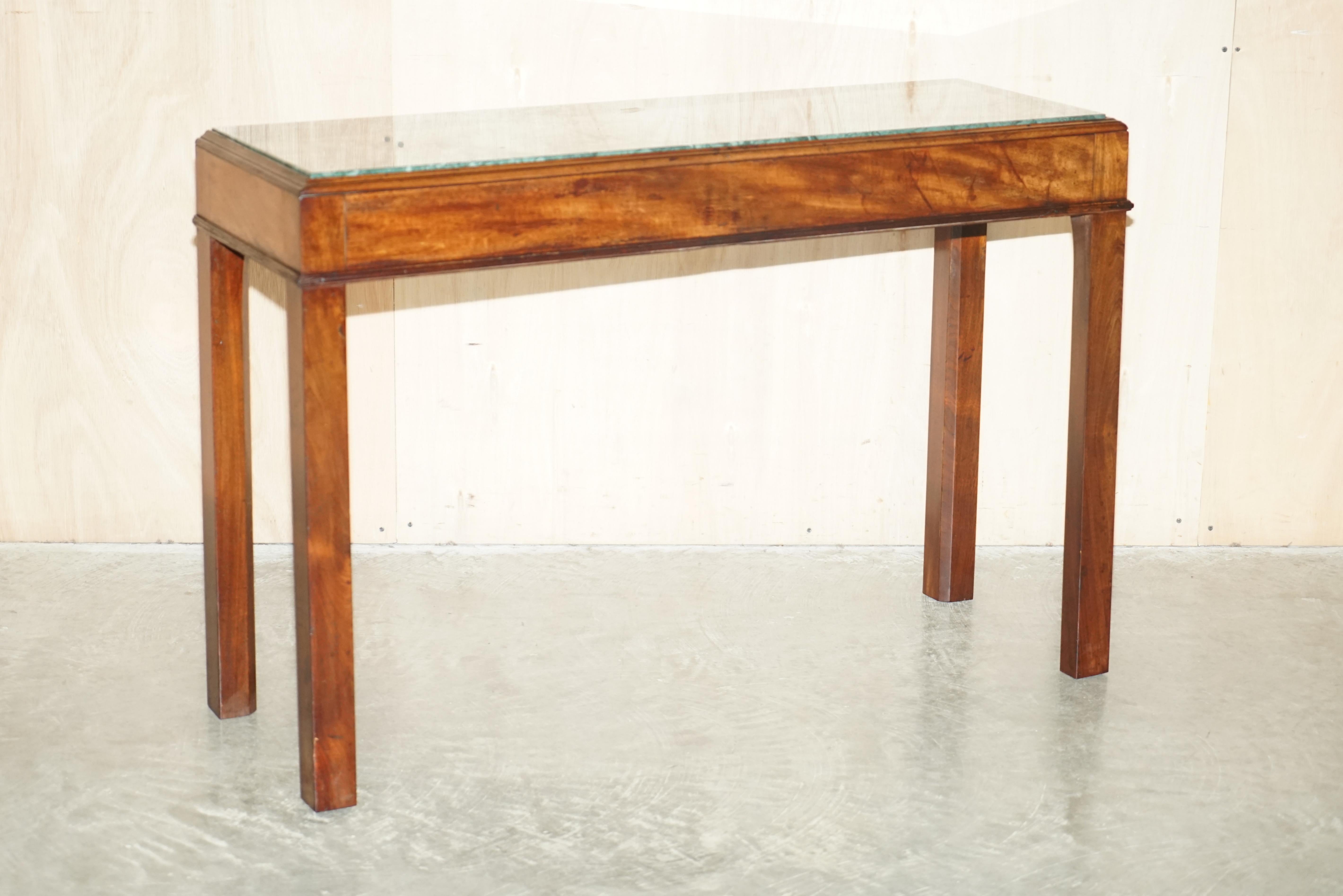 We are delighted to offer for sale this lovely English Thomas Chippendale style circa 1860 Green Marble & Mahogany console table 

Please note the delivery fee listed is just a guide, it covers within the M25 only for the UK and local Europe only